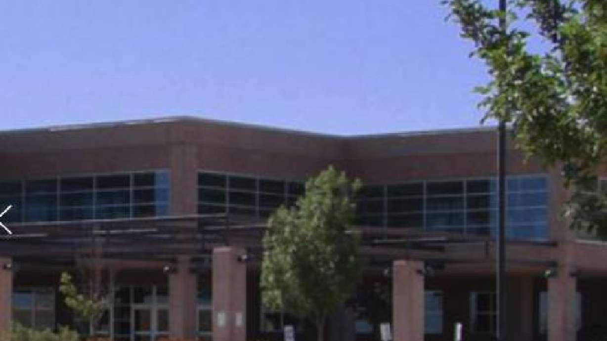 Police say two 14-year-old boys took a gun into a bathroom at Desert Hills Middle School in St. George and accidentally fired a round.