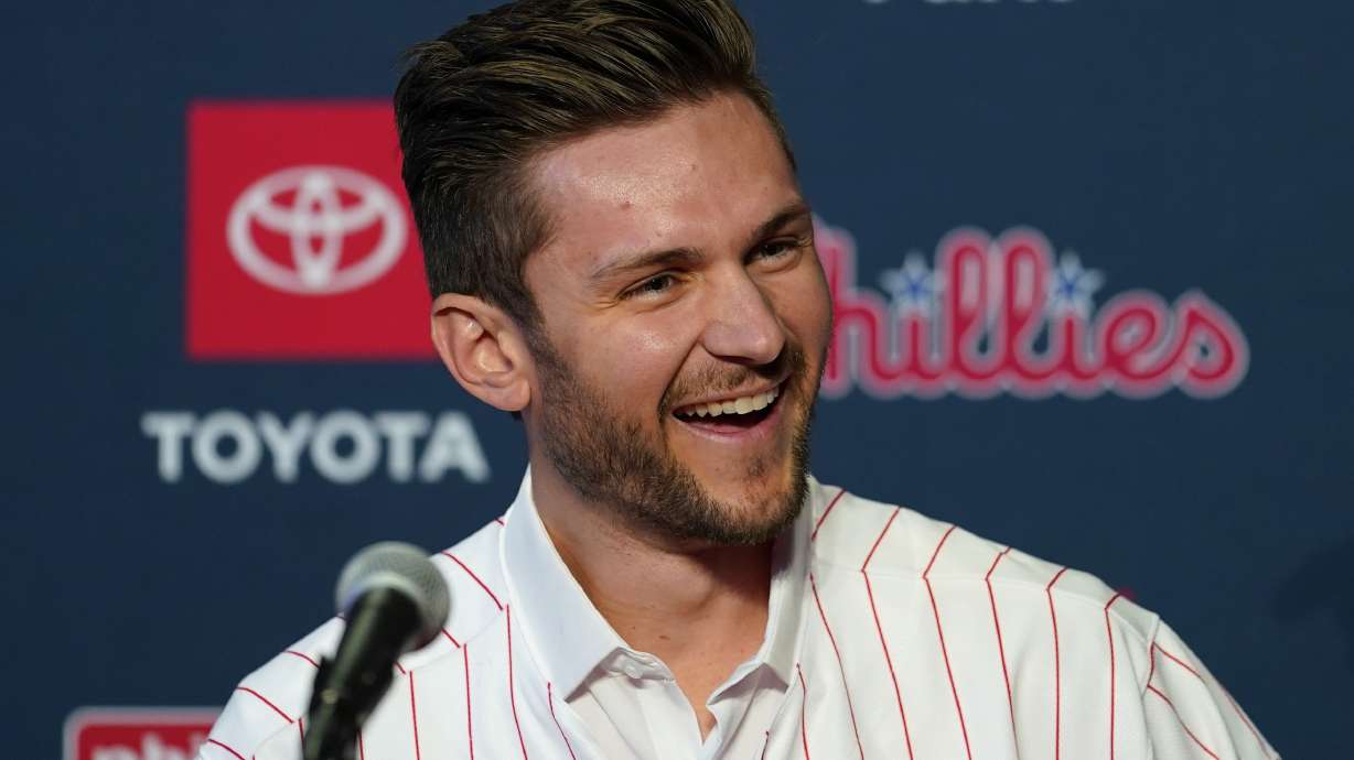 Newly acquired Philadelphia Phillies shortstop Trea Turner laughs during his introductory news conference, Thursday, Dec. 8, 2022, in Philadelphia.
