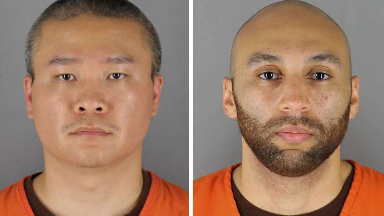 This combo of photos provided by the Hennepin County Sheriff's Office in Minnesota, show Tou Thao, left, and J. Alexander Kueng. Keung was sentenced to 3 1/2 years in prison for kneeling on George Floyd's back.