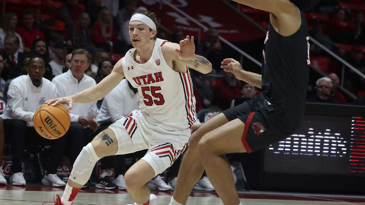 Utah Utes guard Gabe Madsen (55) drives against the Jacksonville State Gamecocks at the Jon M. Huntsman Center in Salt Lake City on Thursday, Dec. 8, 2022.
