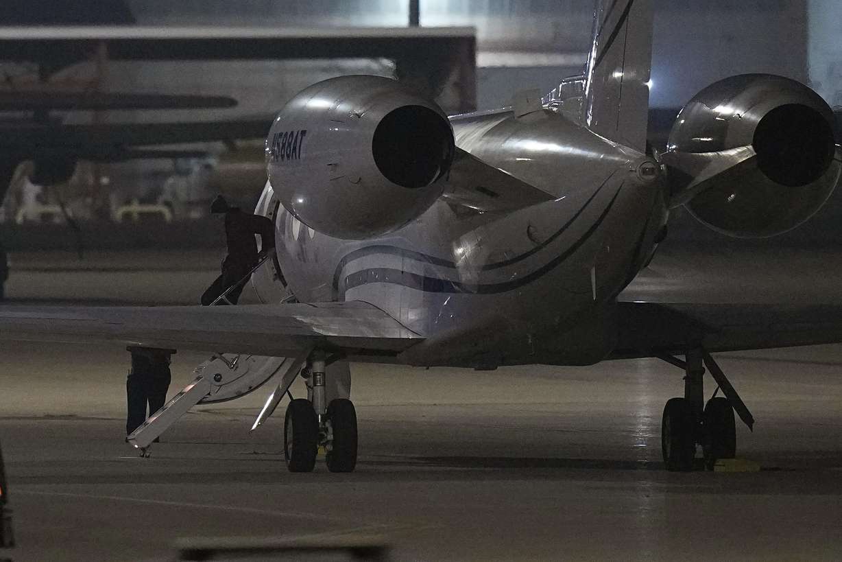 WNBA star Brittney Griner deplanes at Kelly Field in San Antonio, Texas, following her release in a prisoner swap with Russia, Friday.