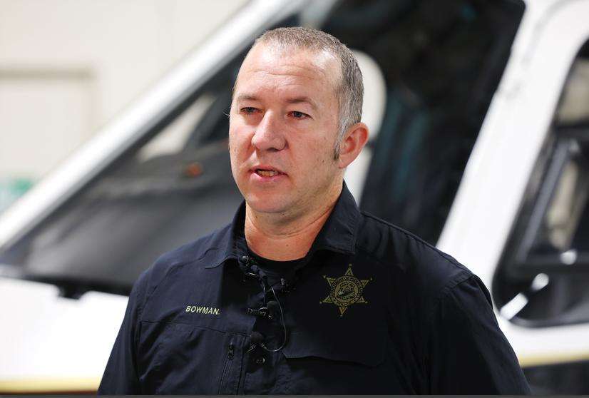 Utah Department of Public Safety pilot Luke Bowman talks with media about the mission to rescue people from a helicopter crash in the La Sal Mountains at a press conference in Salt Lake City on Friday,.