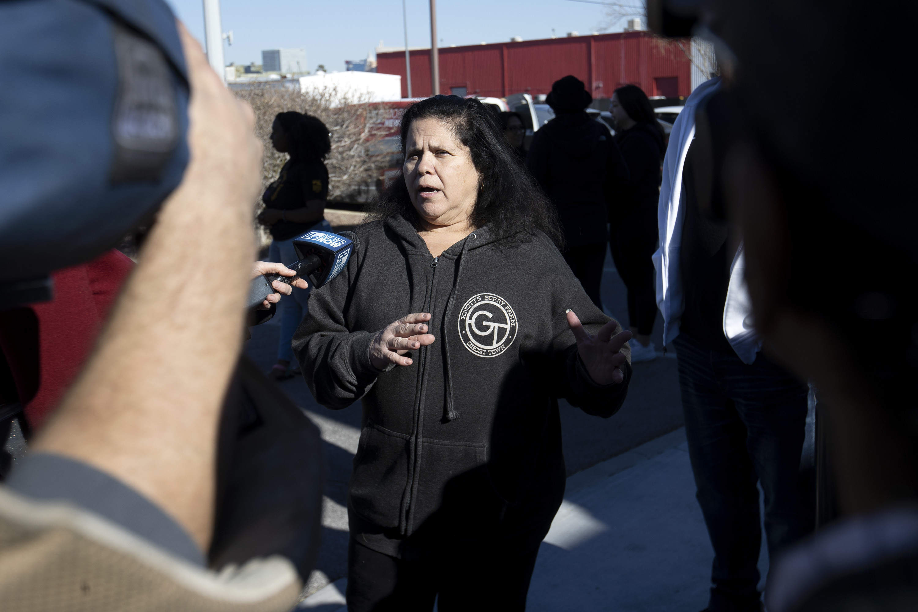 Nina Fernandez, whose son is an inmate at Ely State Prison, speaks to television reporters during a news conference outside the Nevada Department of Corrections Casa Grande Transitional Housing Center, Friday in Las Vegas.