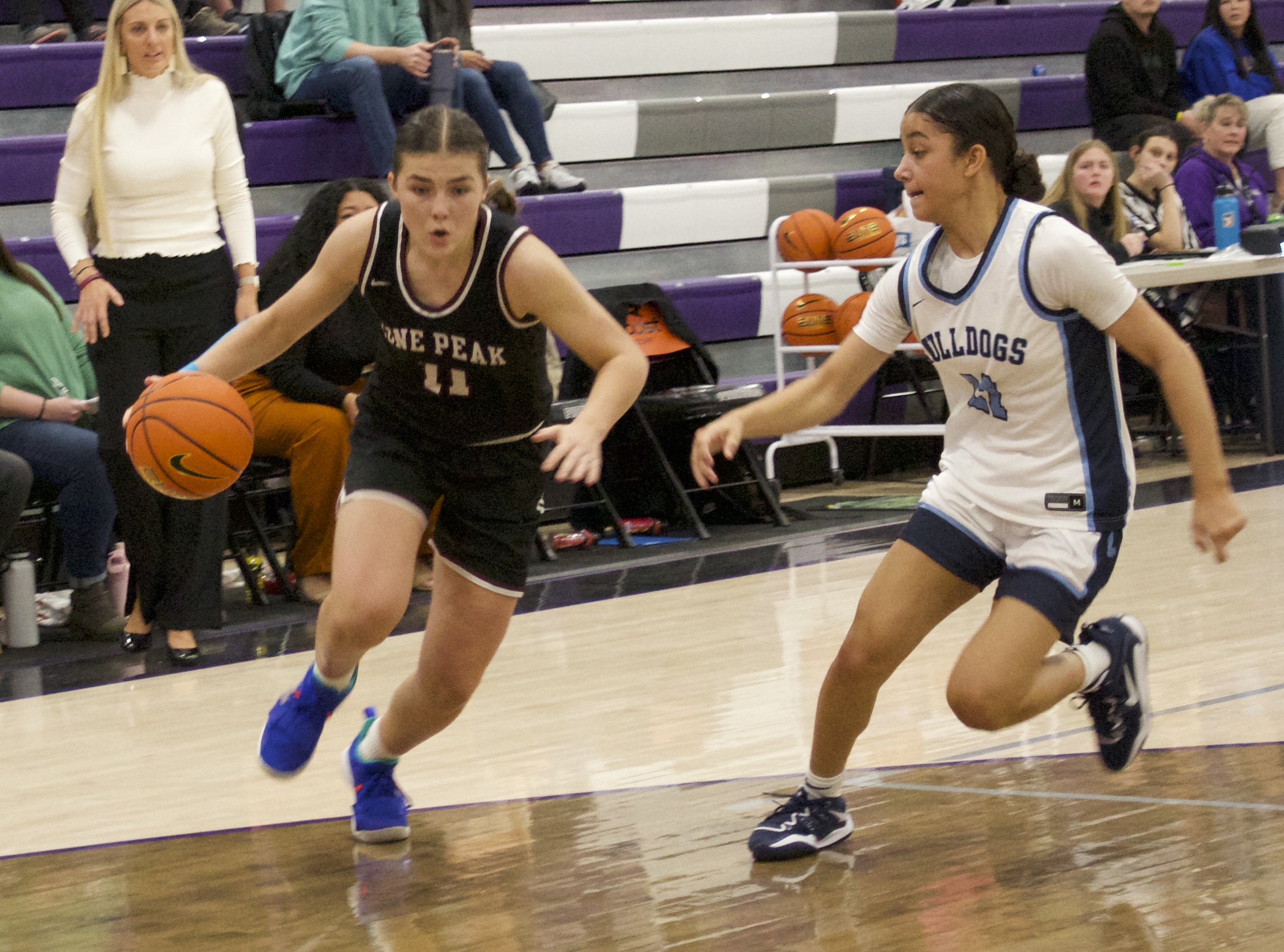 Lone Peak's Kailey Woolston drives to the rim against Centennial as the No. 15 Knights face No. 23 Centennial (Nev.) at Holiday Hoopfest at Lehi High School, Friday, Dec. 9, 2022 in Lehi.