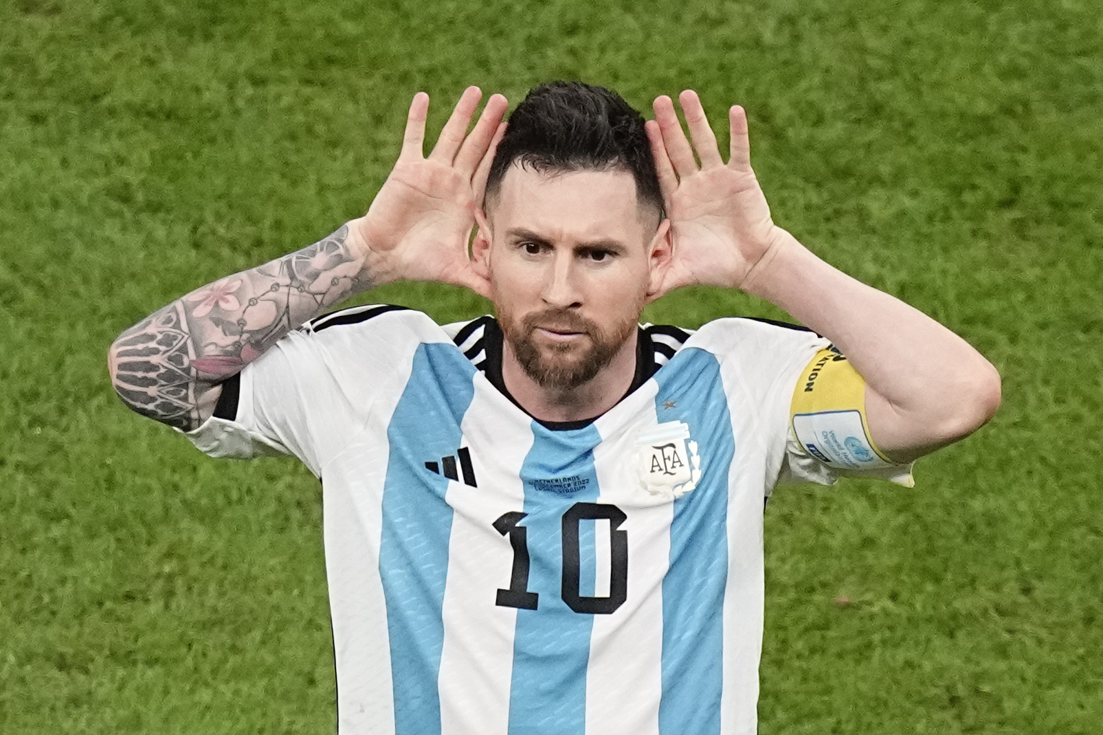 Argentina's Lionel Messi celebrates after scoring during the World Cup quarterfinal soccer match between the Netherlands and Argentina, at the Lusail Stadium in Lusail, Qatar, Friday, Dec. 9, 2022. 