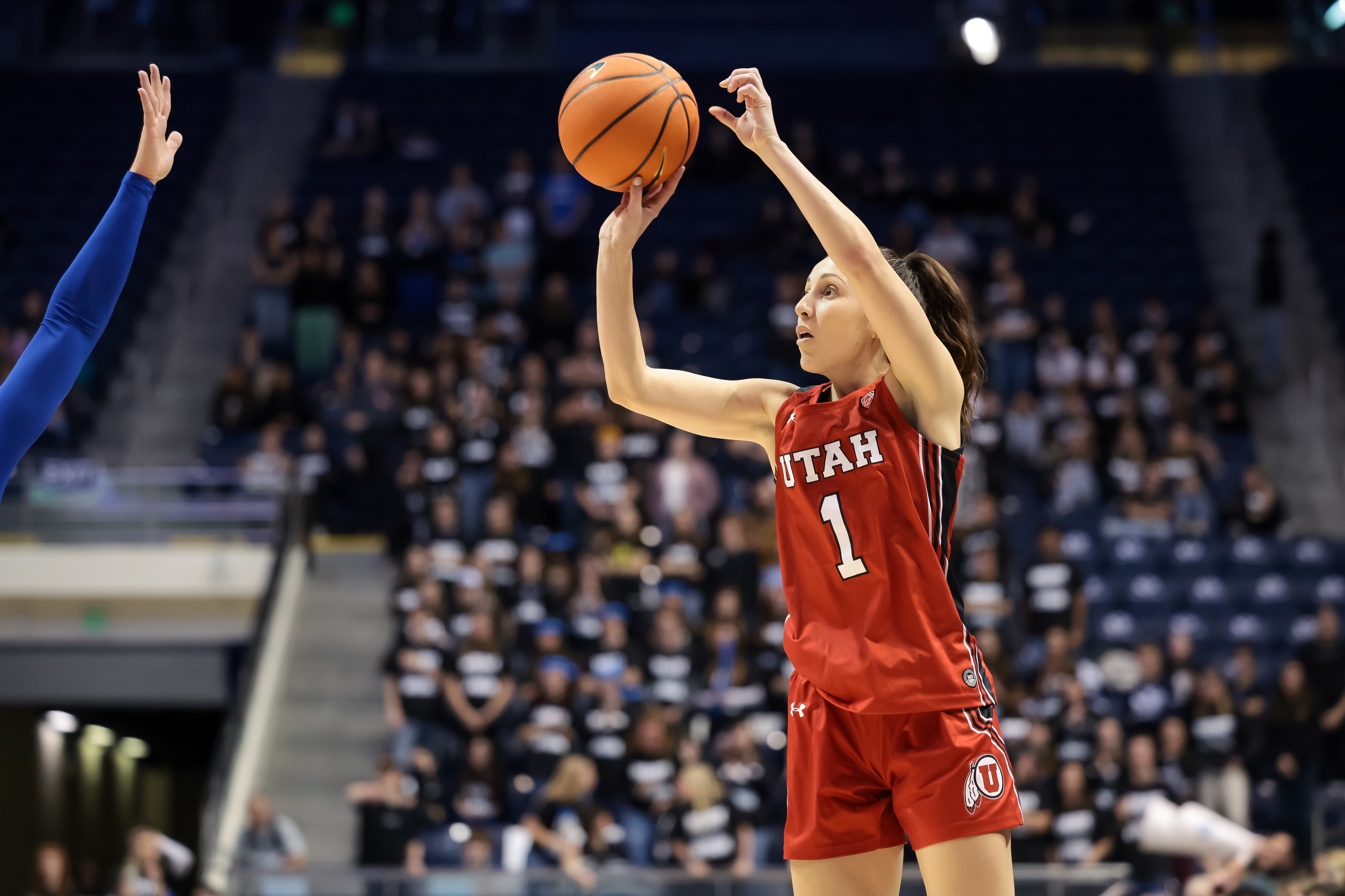 Utah Utes guard Isabel Palmer (1) sinks a three during a game against the BYU Cougars at the Marriott Center in Provo on Saturday, Dec. 10, 2022.