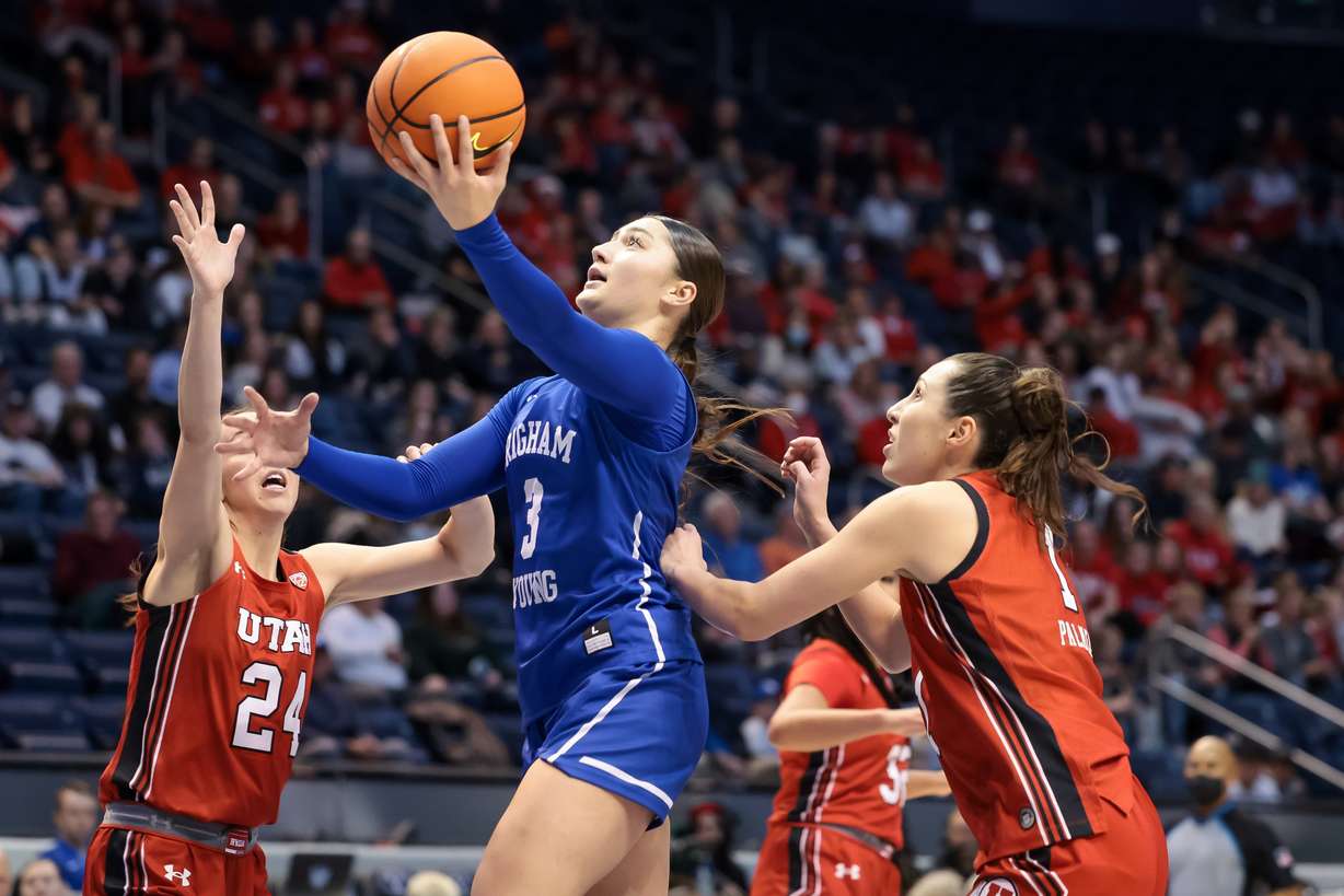BYU guard Nani Falatea (3) goes to the hoop during a game against the Utah Utes at the Marriott Center in Provo on Saturday, Dec. 10, 2022.