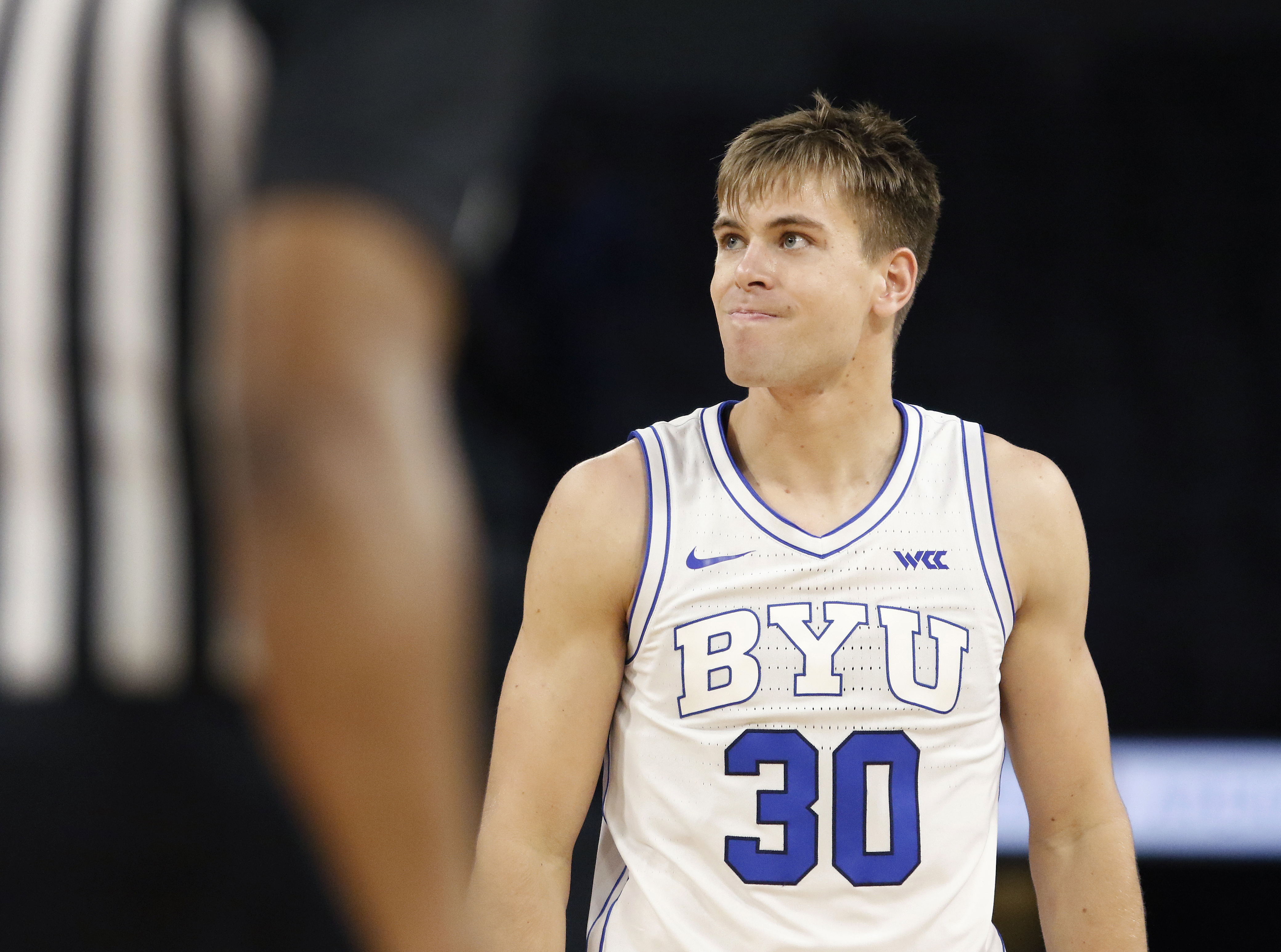 BYU guard Dallin Hall (30) reacts after a play during the first half of an NCAA college basketball game against Creighton, Saturday, Dec. 10, 2022, in Las Vegas.