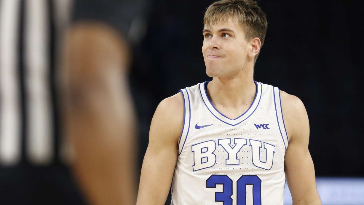 BYU guard Dallin Hall (30) reacts after a play during the first half of an NCAA college basketball game against Creighton, Saturday, Dec. 10, 2022, in Las Vegas.