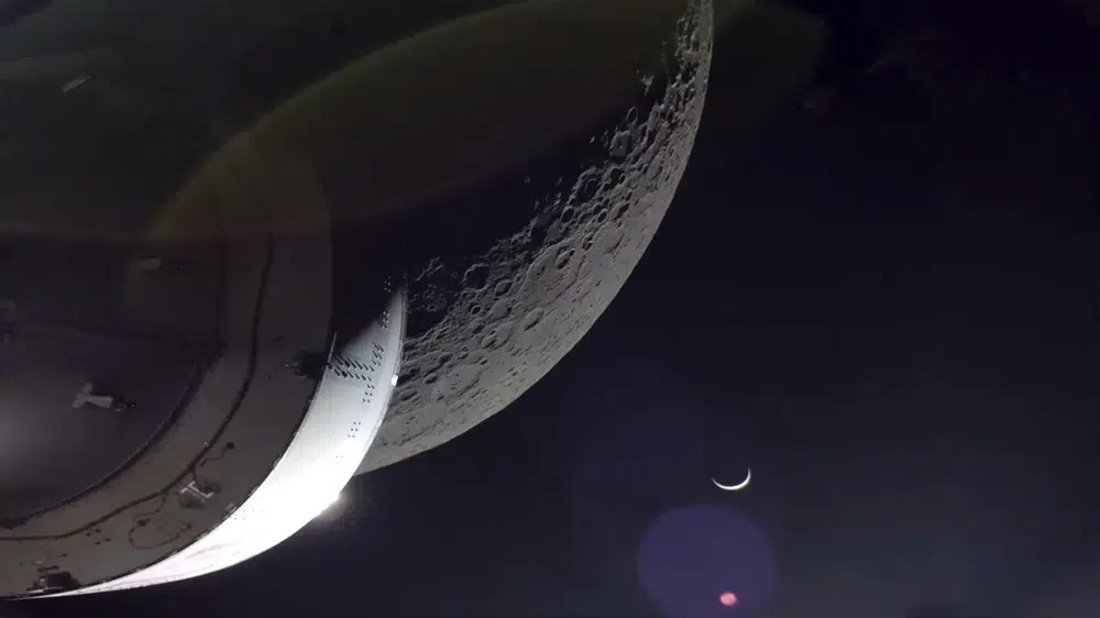 NASA's Orion spacecraft beamed back close-up photos of the moon and Earth on Dec. 5. The crew capsule and its test dummies will aim for a Pacific Ocean splashdown on Sunday off the coast of San Diego after a three-week test flight, setting the stage for astronauts on the next flight in a couple years.