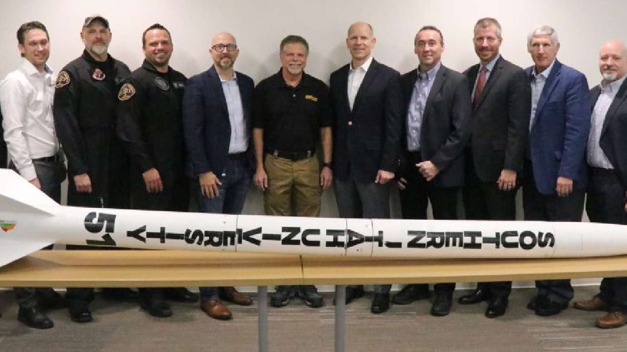 Local business and education officials at a news conference celebrating Cedar City’s involvement in the aerospace industry, Cedar City, Thursday.