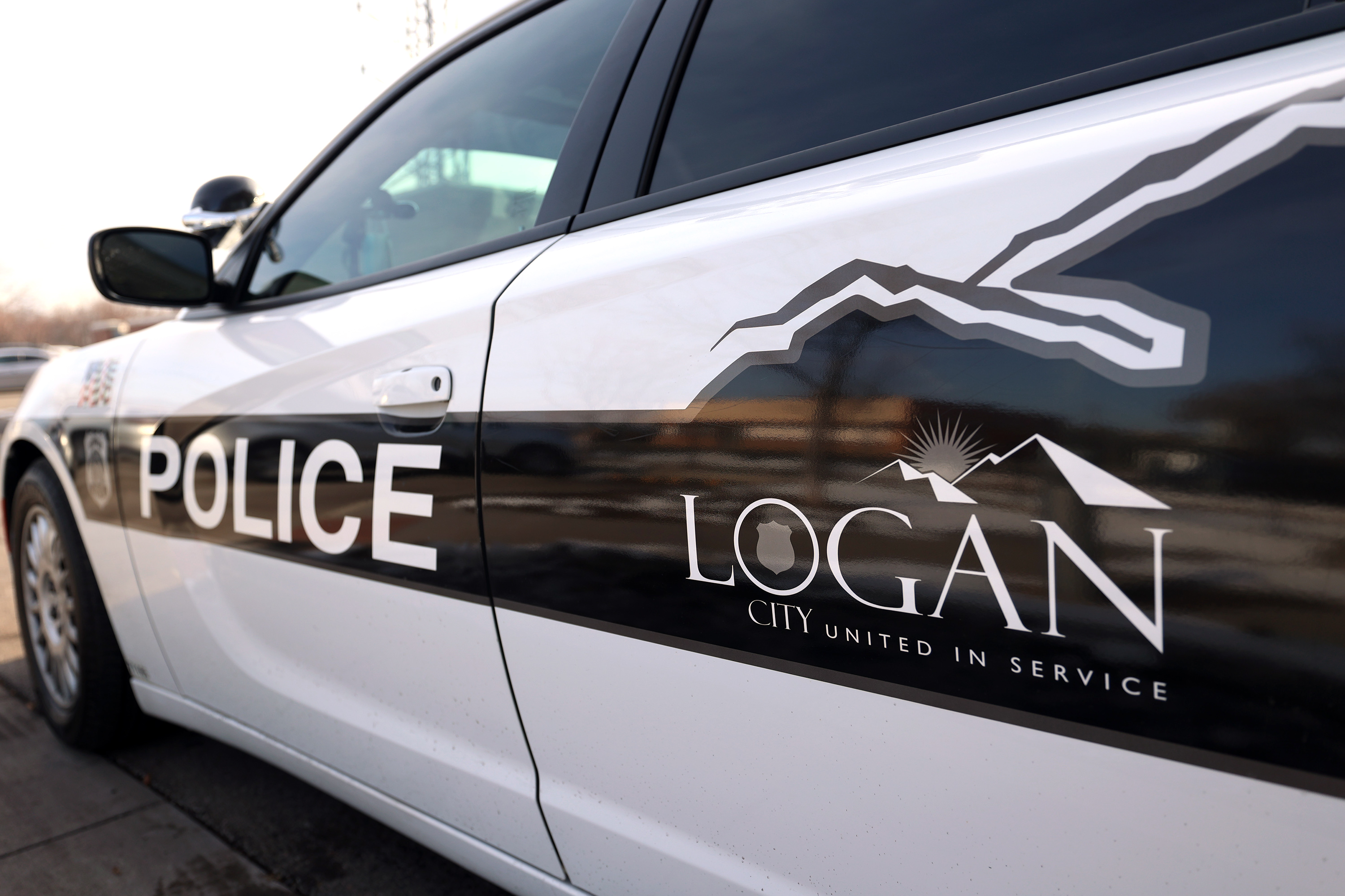 A woman was killed in a crash in Logan early Monday.