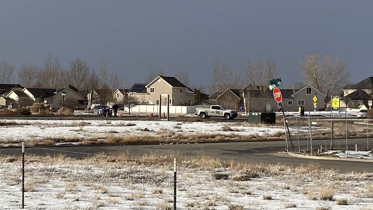 The scene of a standoff in Eagle Mountain on Monday afternoon. A family argument over care for a 96-year-old father prompted a man to fire multiple rounds at his sister and brother-in-law Monday, resulting in an injury and three-hour standoff, police say.