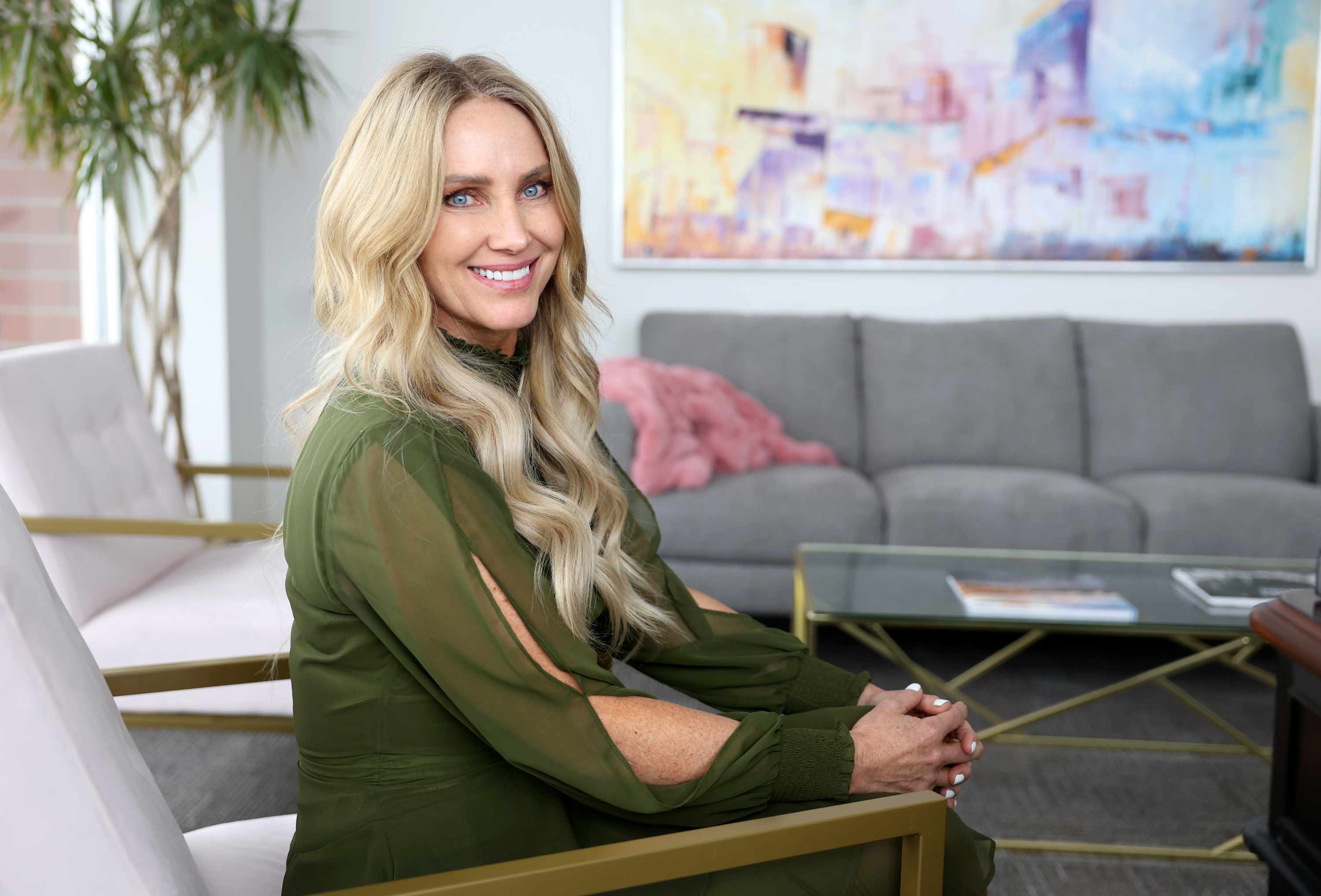 Brandy Grace, Utah Association of Counties CEO, poses for a portrait in her office at the Utah Association of Counties in Murray on Tuesday. Grace took some classes at Southern Utah University but never earned a degree. The state is working to eliminate the requirement for degrees when hiring state employees.