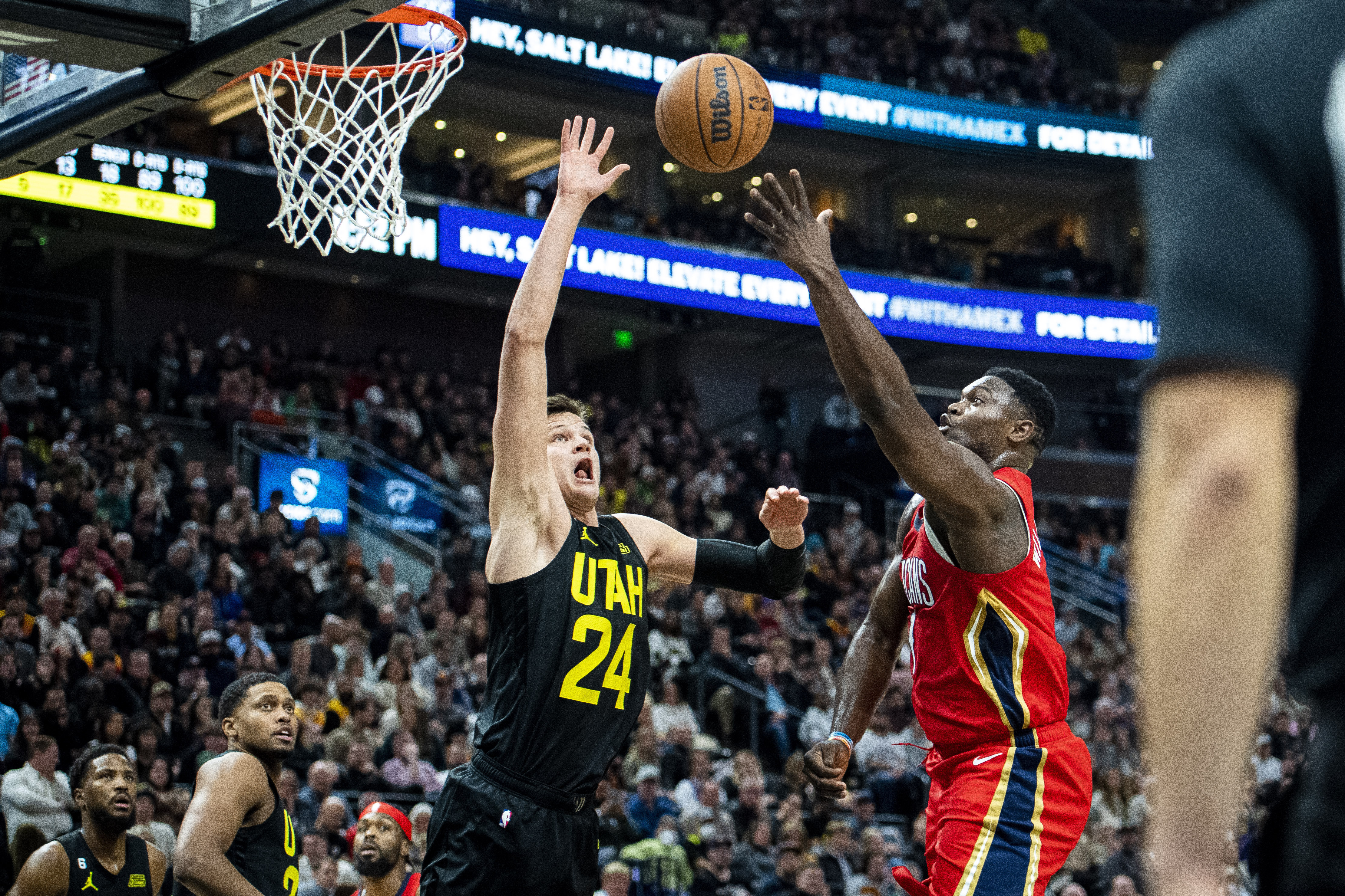 Utah Jazz center Walker Kessler (24) blocks a shot from New Orleans Pelicans forward Zion Williamson, right, in the second half during an NBA basketball game Tuesday, Dec. 13, 2022, in Salt Lake City.


