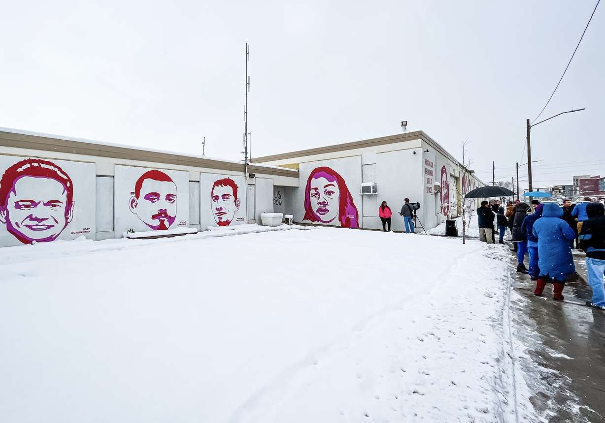 Salt Lake City leaders and some family members of people depicted on the "Fleet Block" wall gather outside of the property on Dec. 14, 2022. The City Council voted to rezone the property Tuesday night.