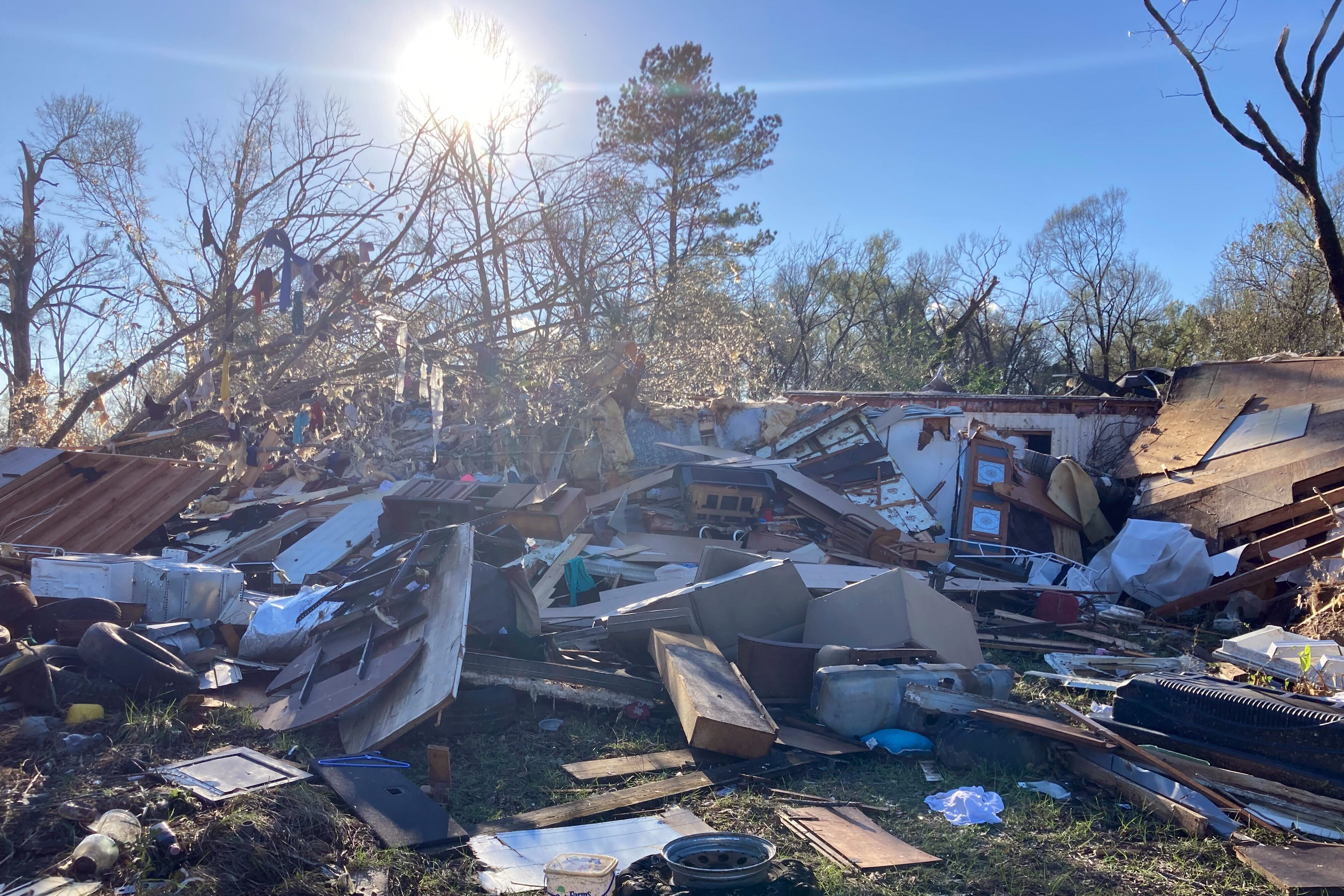 Debris is piled up following severe weather Wednesday in Keithville, La. 