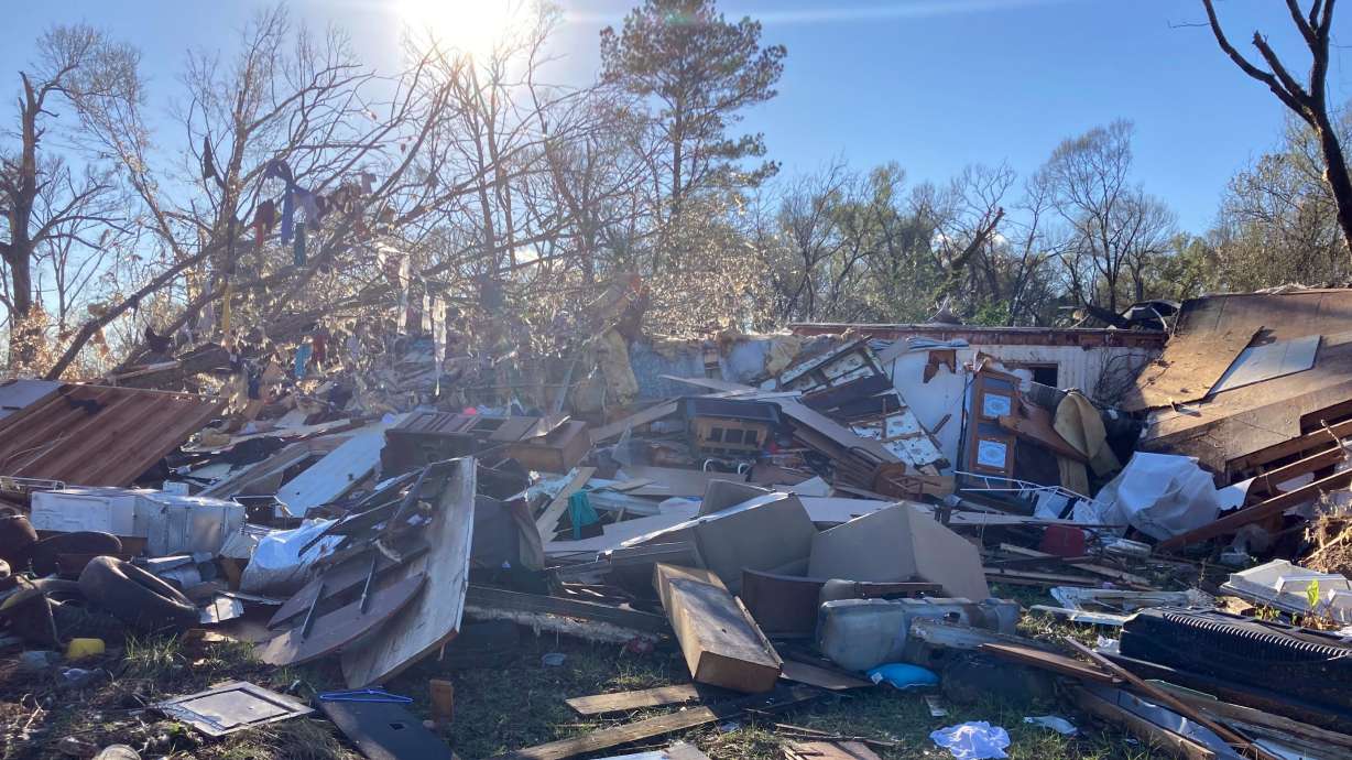 Debris is piled up following severe weather Wednesday in Keithville, La.