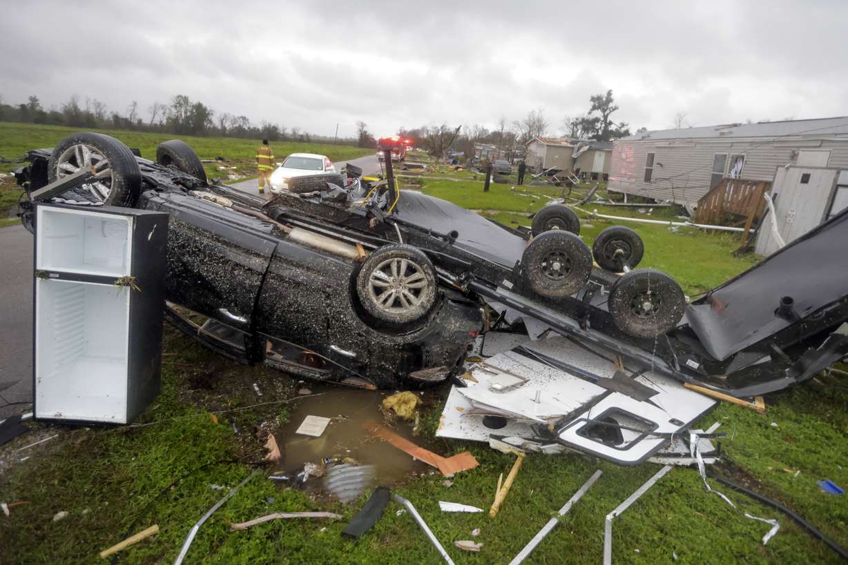 Damage is seen along Schoolhouse Road after a tornado moved through area in Killona, La., Wednesday.
