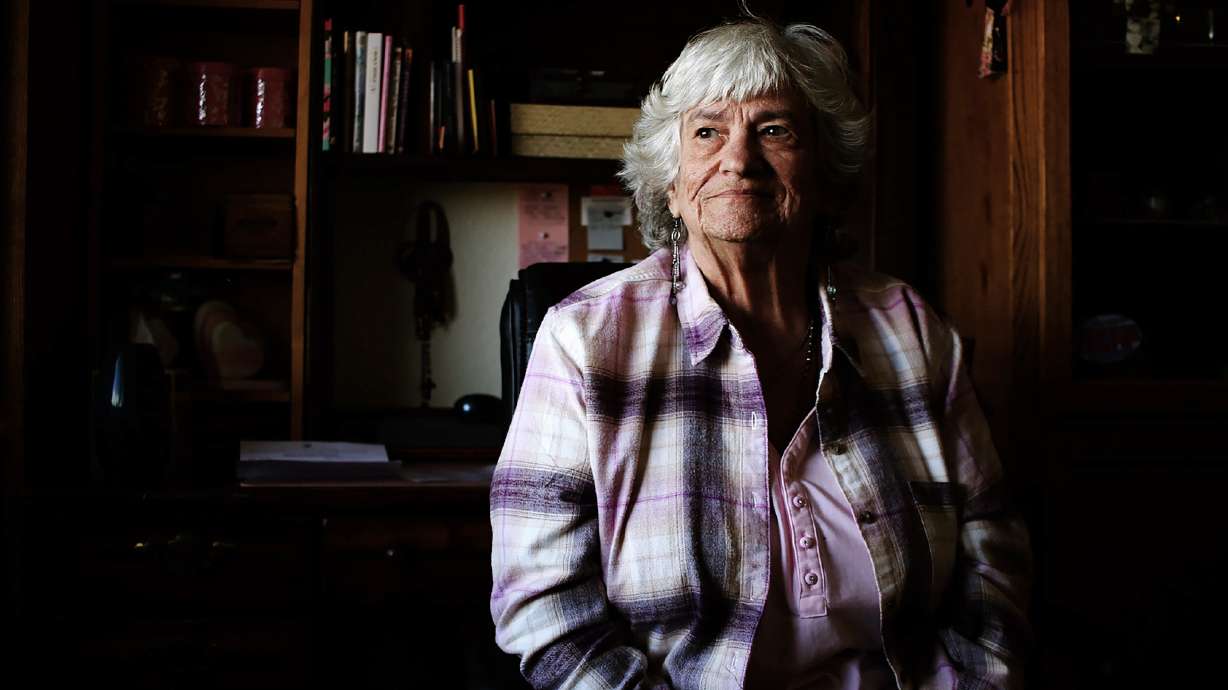 Kasey Dungan, 73, sits in her subsidized apartment in Phoenix, Ariz. for older adults on Monday, and says she feels fortunate. She fell into homelessness early this year. But high costs for food and other bills mean her entire Social Security check is gone by month's end.