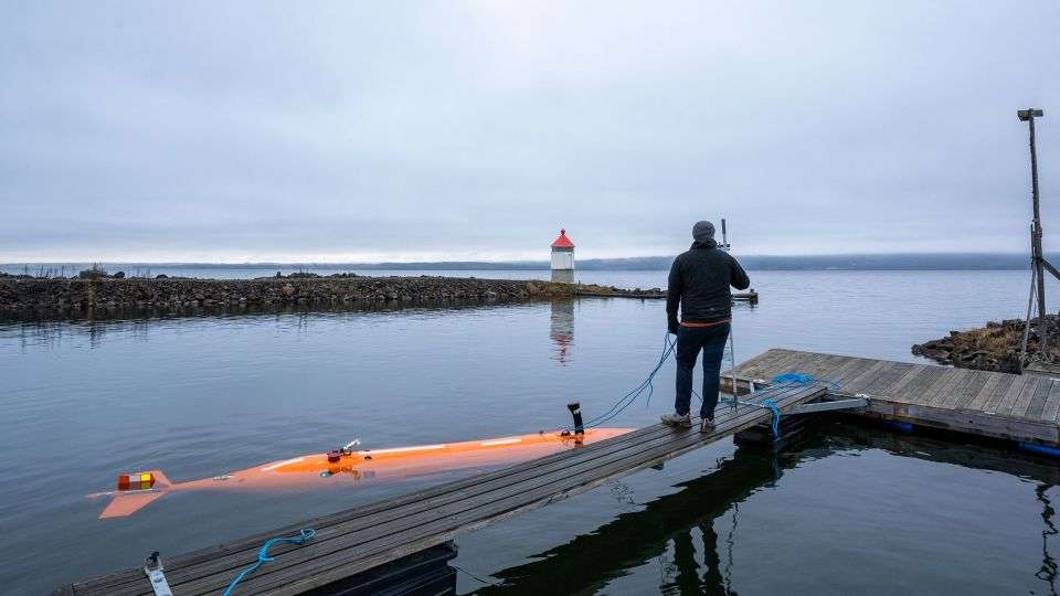 The autonomous underwater vehicle named Hugin (pictured) is being used for the first time in a freshwater environment to survey the lake bed of Mjøsa in Norway. The autonomous underwater vehicle named Hugin (pictured) is being used for the first time in a freshwater environment to survey the lake bed of Mjøsa in Norway.