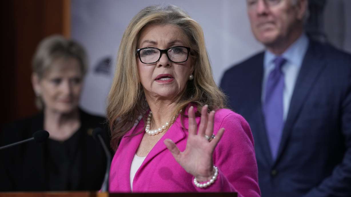 Sen. Marsha Blackburn, R-Tenn., and other Republican senators tell reporters they want the COVID-19 vaccine mandate for members of the U.S. military to be rescinded under the annual defense bill, at the Capitol in Washington, Thursday.