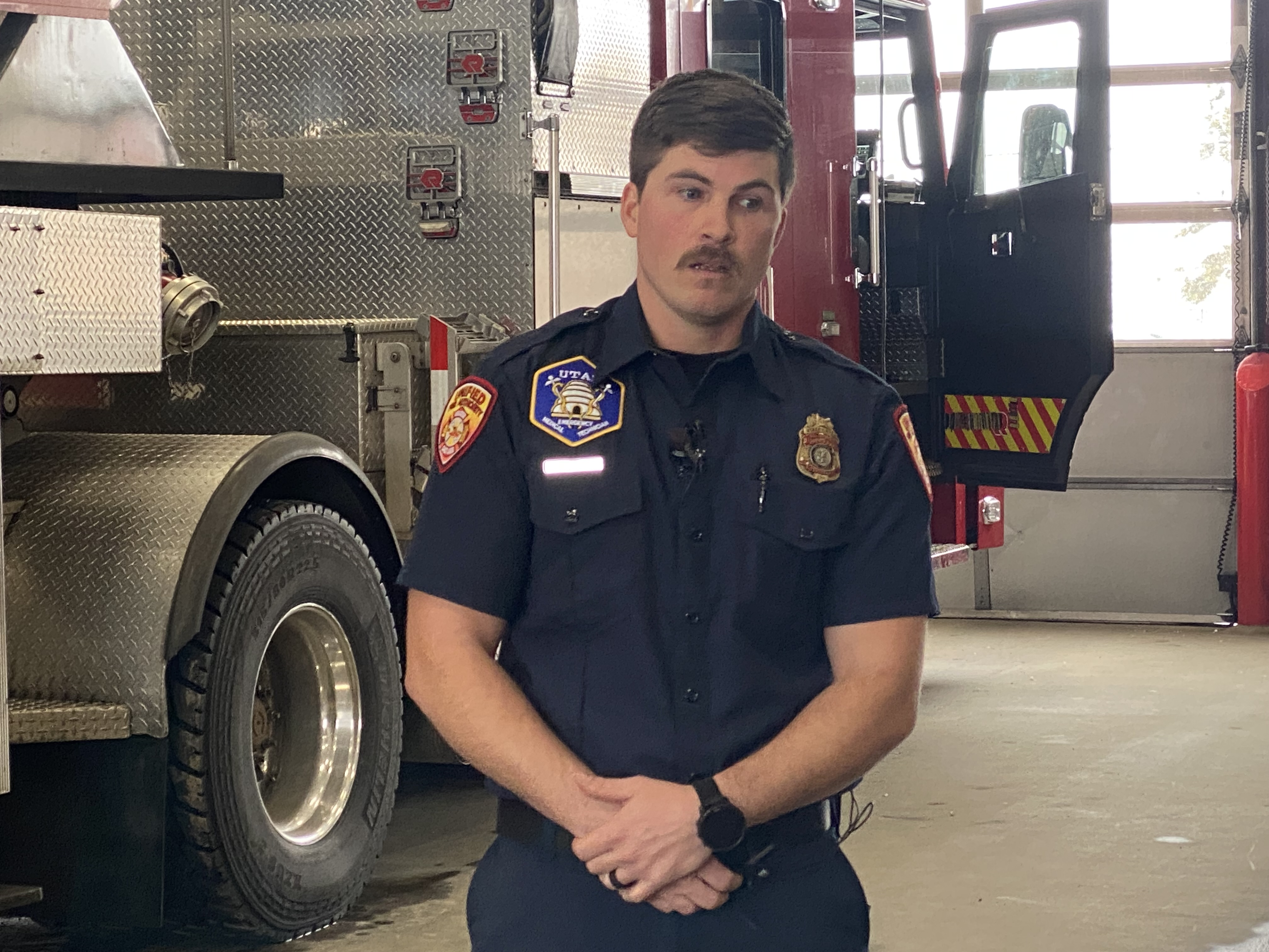 Unified Fire Authority firefighter Tom Elbrecht speaks to news reporters on Thursday. Elbrecht was off duty the day before when he dug a backcountry skier out of an avalanche in Neff's Canyon and tended to him while they waited for rescue.