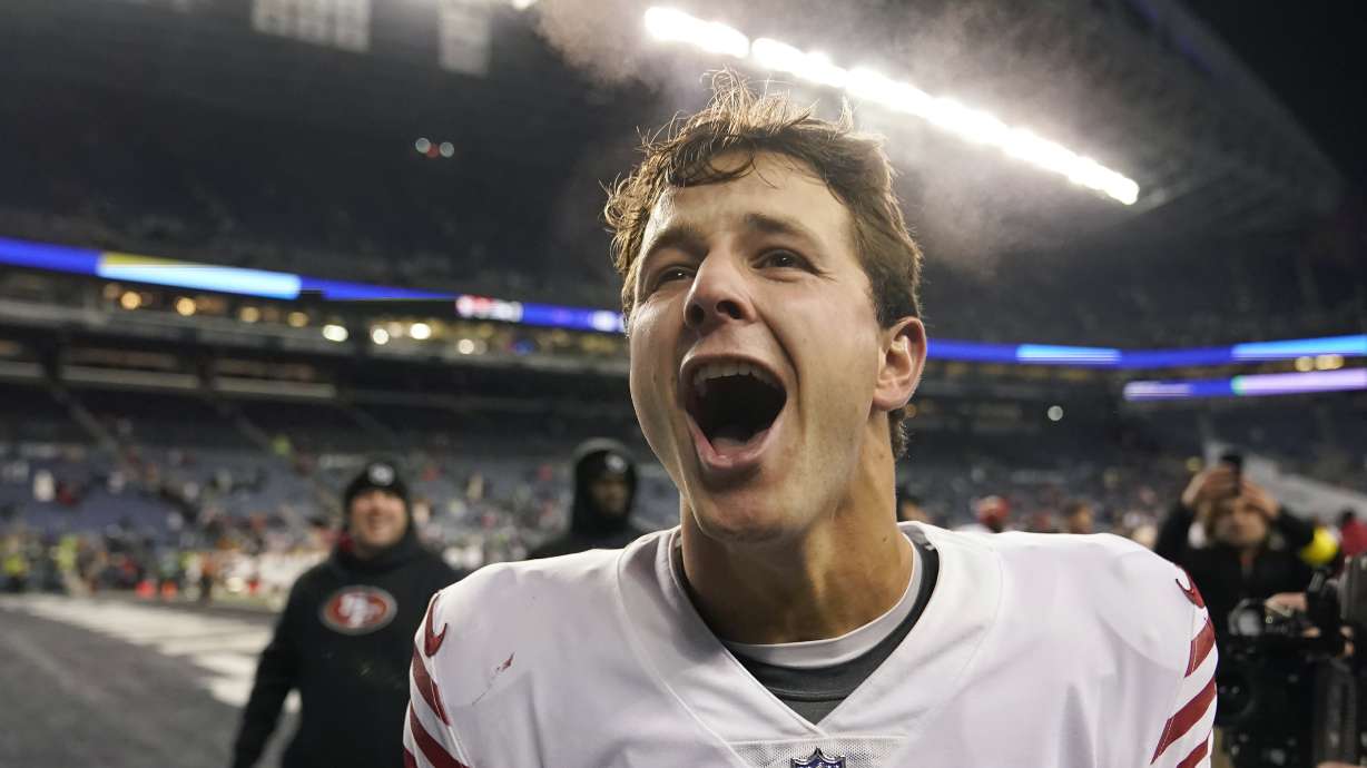 San Francisco 49ers quarterback Brock Purdy celebrates after the 49ers defeated the Seattle Seahawks in an NFL football game in Seattle, Thursday, Dec. 15, 2022.