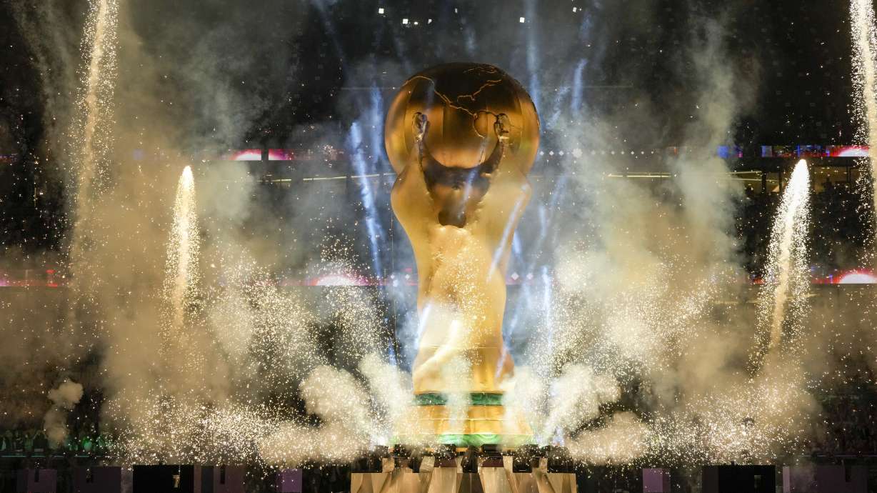 The World Cup trophy replica is shown during the opening ceremony in the World Cup quarterfinal soccer match between Croatia and Brazil, at the Education City Stadium in Al Rayyan, Qatar, Friday, Dec. 9, 2022.