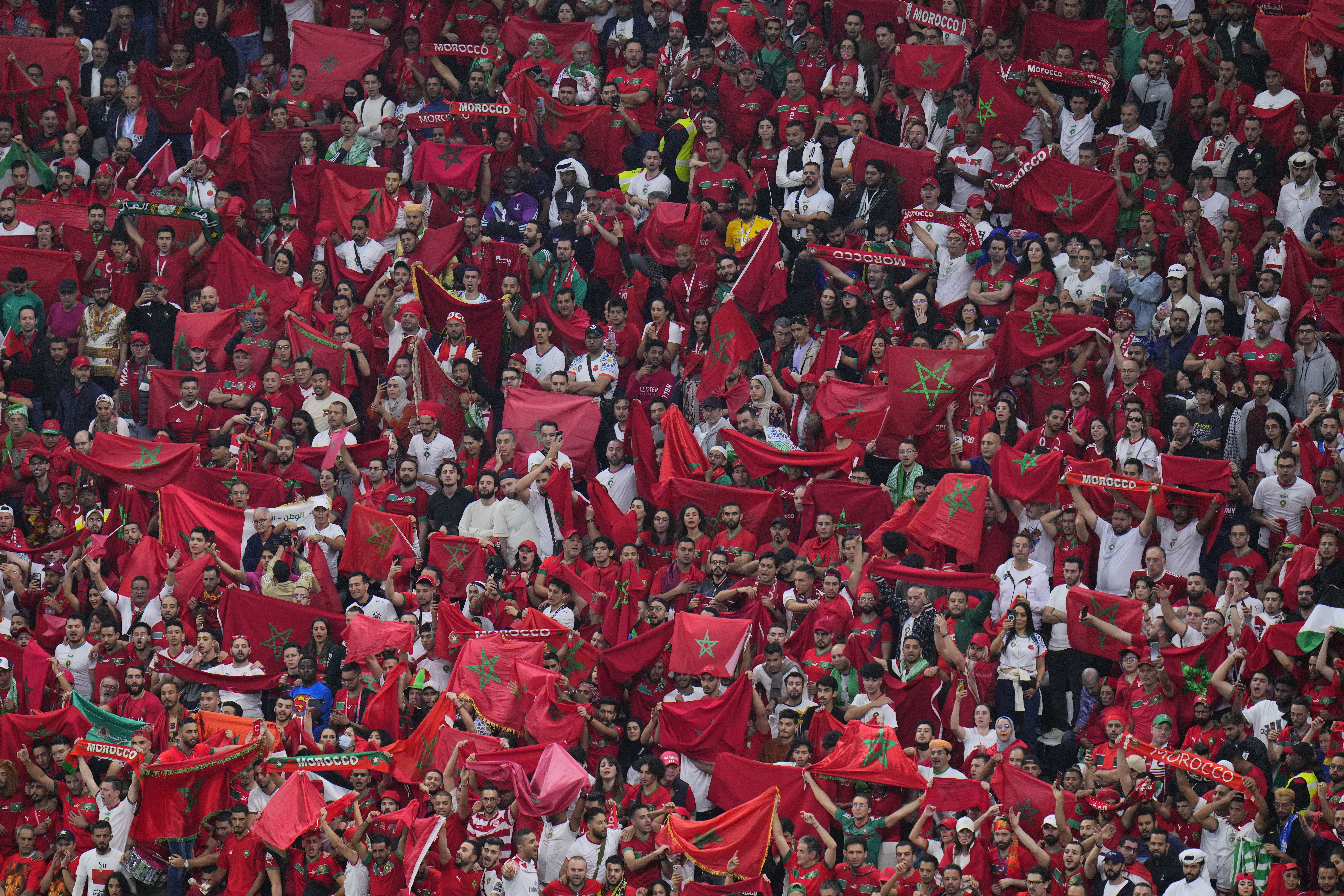Moroccan fans cheer during the World Cup semifinal soccer match between France and Morocco at the Al Bayt Stadium in Al Khor, Qatar, Wednesday, Dec. 14, 2022.