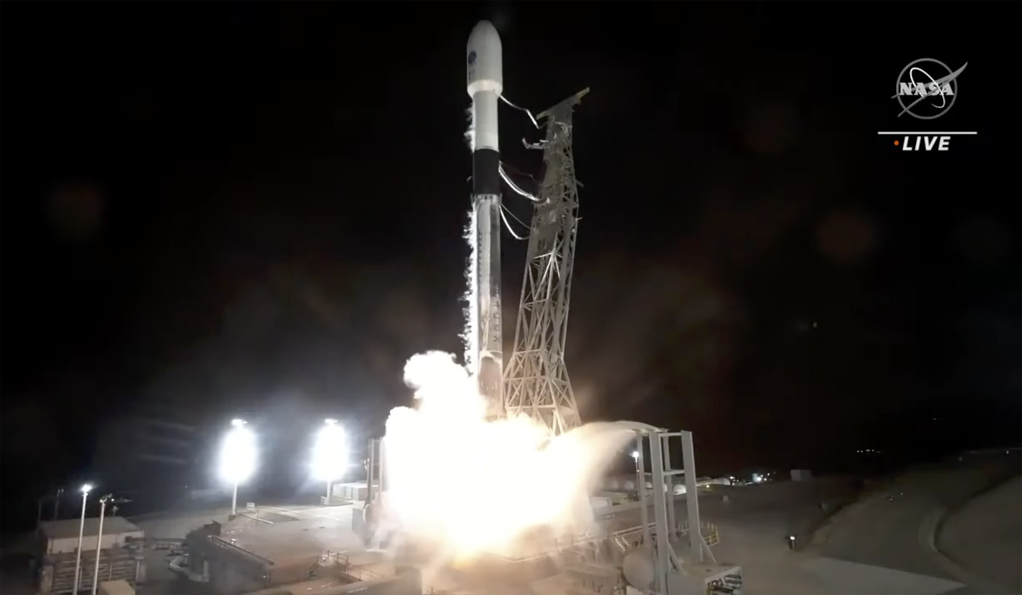 A SpaceX rocket carrying the Surface Water and Ocean Topography satellite lifts off from Vandenberg Space Force Base in California, Friday.