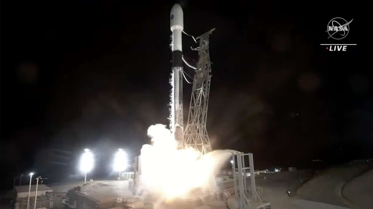 A SpaceX rocket carrying the Surface Water and Ocean Topography satellite lifts off from Vandenberg Space Force Base in California, Friday.