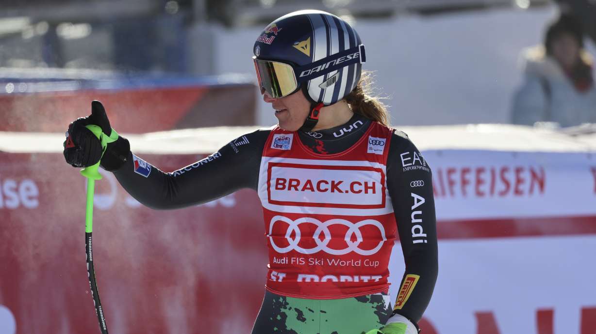 Italy's Sofia Goggia reacts after crossing the finish line to complete an alpine ski, women's World Cup downhill race, in St. Moritz, Switzerland, Saturday, Dec. 17, 2022.