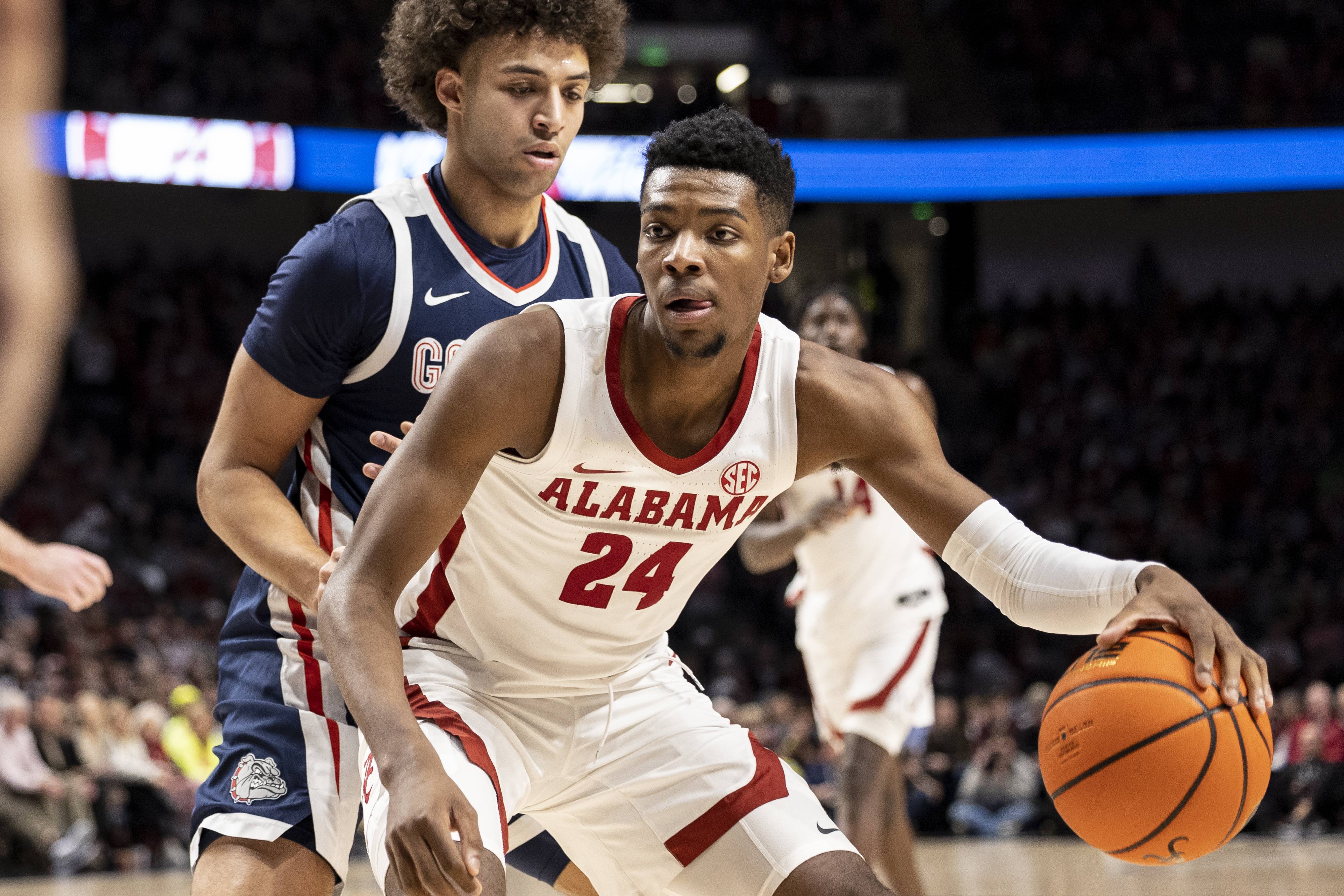 Alabama forward Brandon Miller (24) works against Gonzaga forward Anton Watson (22) during the first half of an NCAA college basketball game, Saturday, Dec. 17, 2022, in Birmingham, Ala.