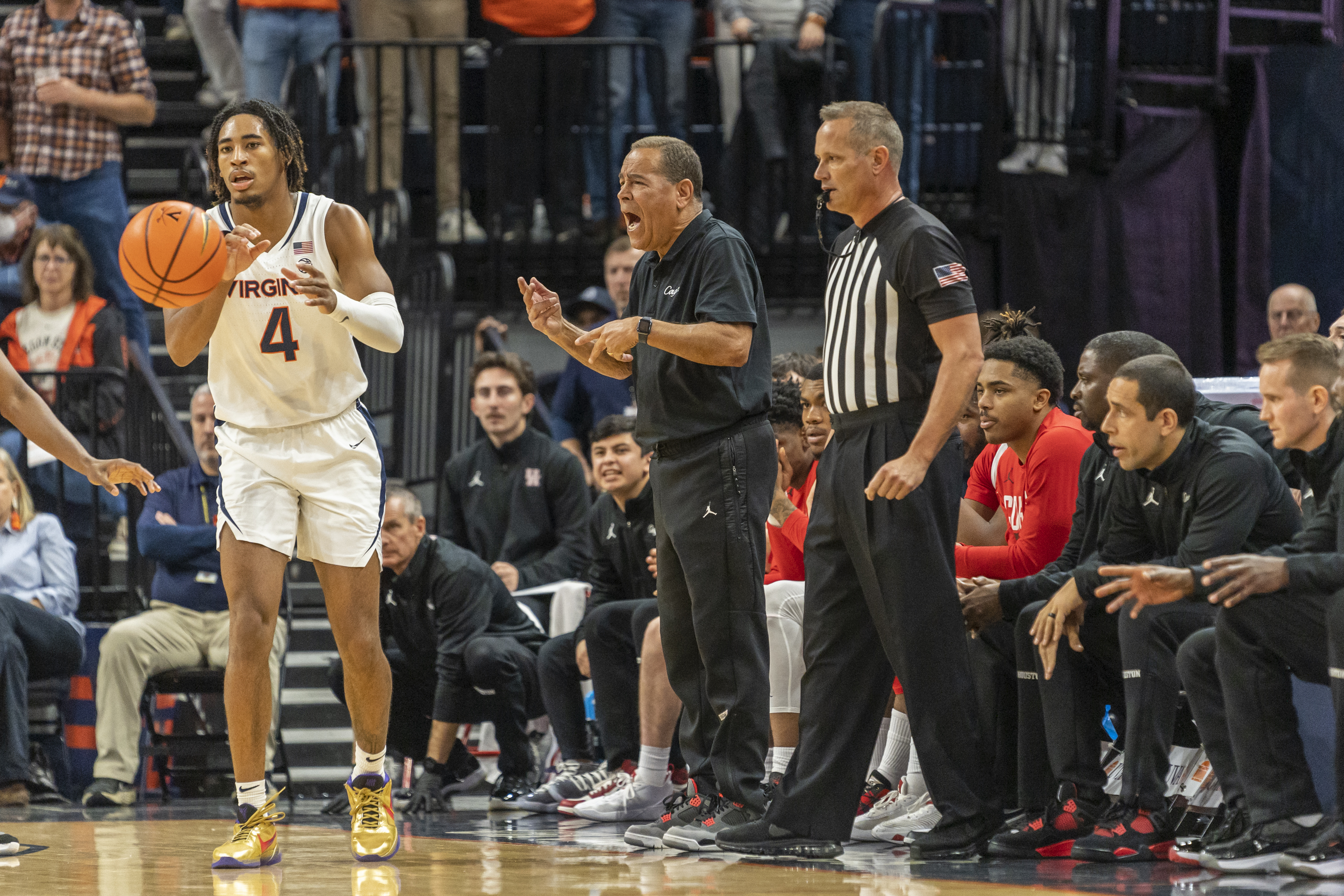 Houston head coach Kelvin Sampson calls out during the first half of an NCAA college basketball game against Virginia in Charlottesville, Va., Saturday, Dec. 17, 2022. 