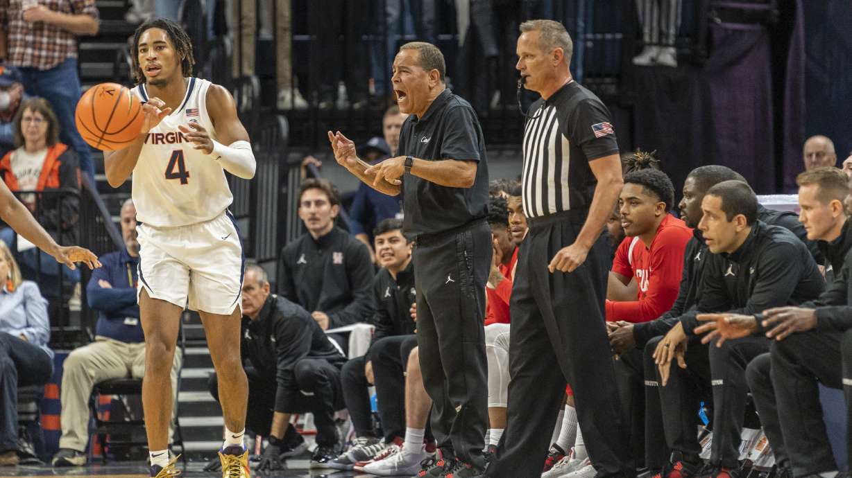 Houston head coach Kelvin Sampson calls out during the first half of an NCAA college basketball game against Virginia in Charlottesville, Va., Saturday, Dec. 17, 2022.