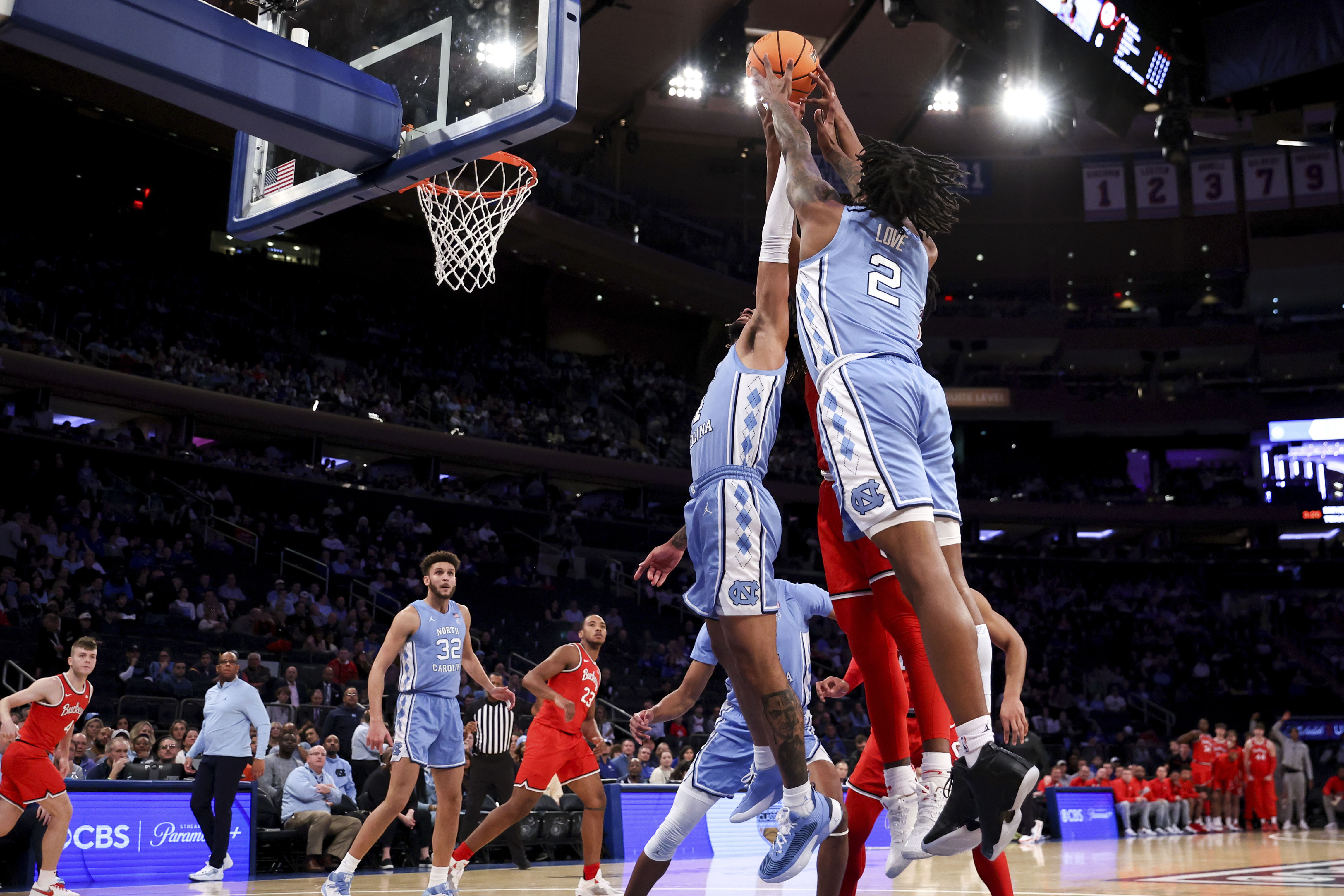 North Carolina guard Caleb Love (2) grabs the ball during the first half of an NCAA college basketball game against Ohio State in the CBS Sports Classic, Saturday, Dec. 17, 2022, in New York. 