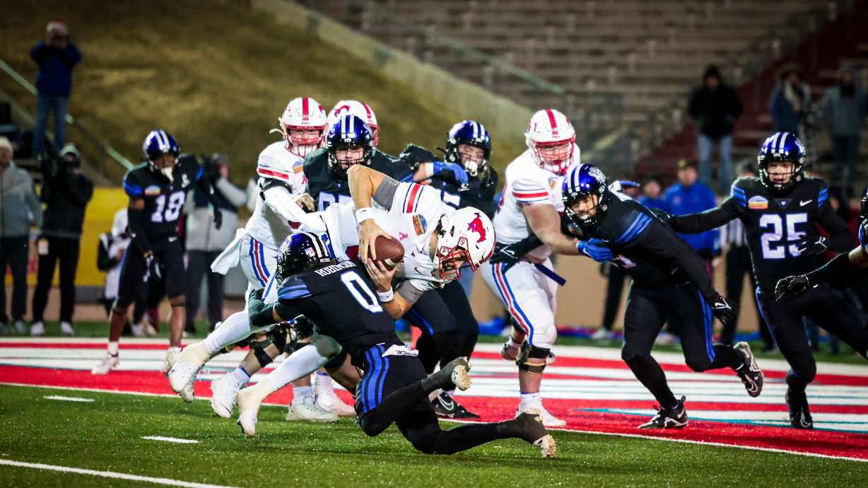 BYU nickel Jakob Robinson makes a tackle on a 2-point conversion attempt to seal BYU's 24-23 win over SMU in the New Mexico Bowl, Saturday, Dec. 17, 2022 in Albuquerque, N.M.