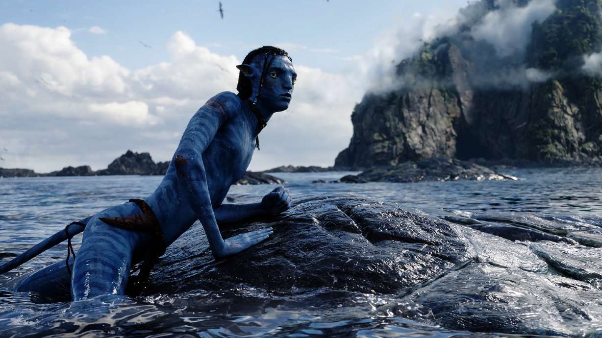 This image released by 20th Century Studios shows Britain Dalton, as Lo'ak, in a scene from "Avatar: The Way of Water."