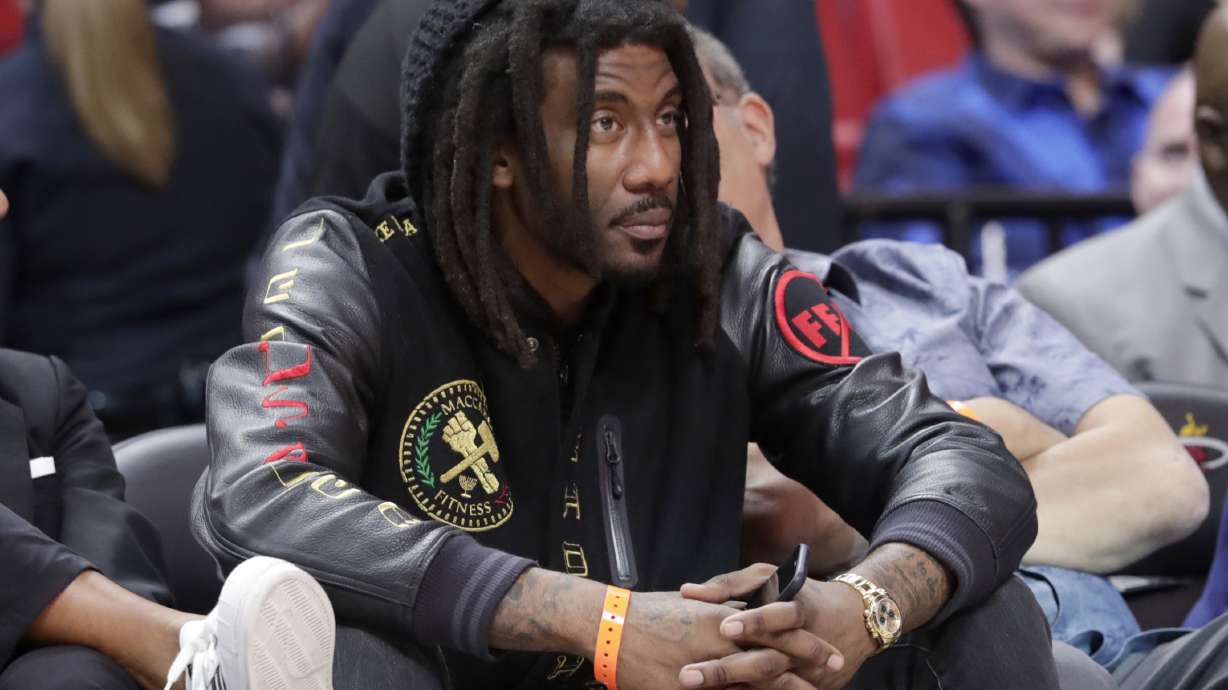 FILE - Former NBA basketball player Amar'e Stoudemire watches during the second half of an NBA basketball game between the Miami Heat and Sacramento Kings, Monday, Jan. 20, 2020, in Miami. Stoudemire is facing a misdemeanor battery charge after police say he punched his teenage daughter in the face. Court records show the former Phoenix Suns and New York Knicks star was arrested early Sunday, Dec. 18, 2022, and later released on $1,500 bond.