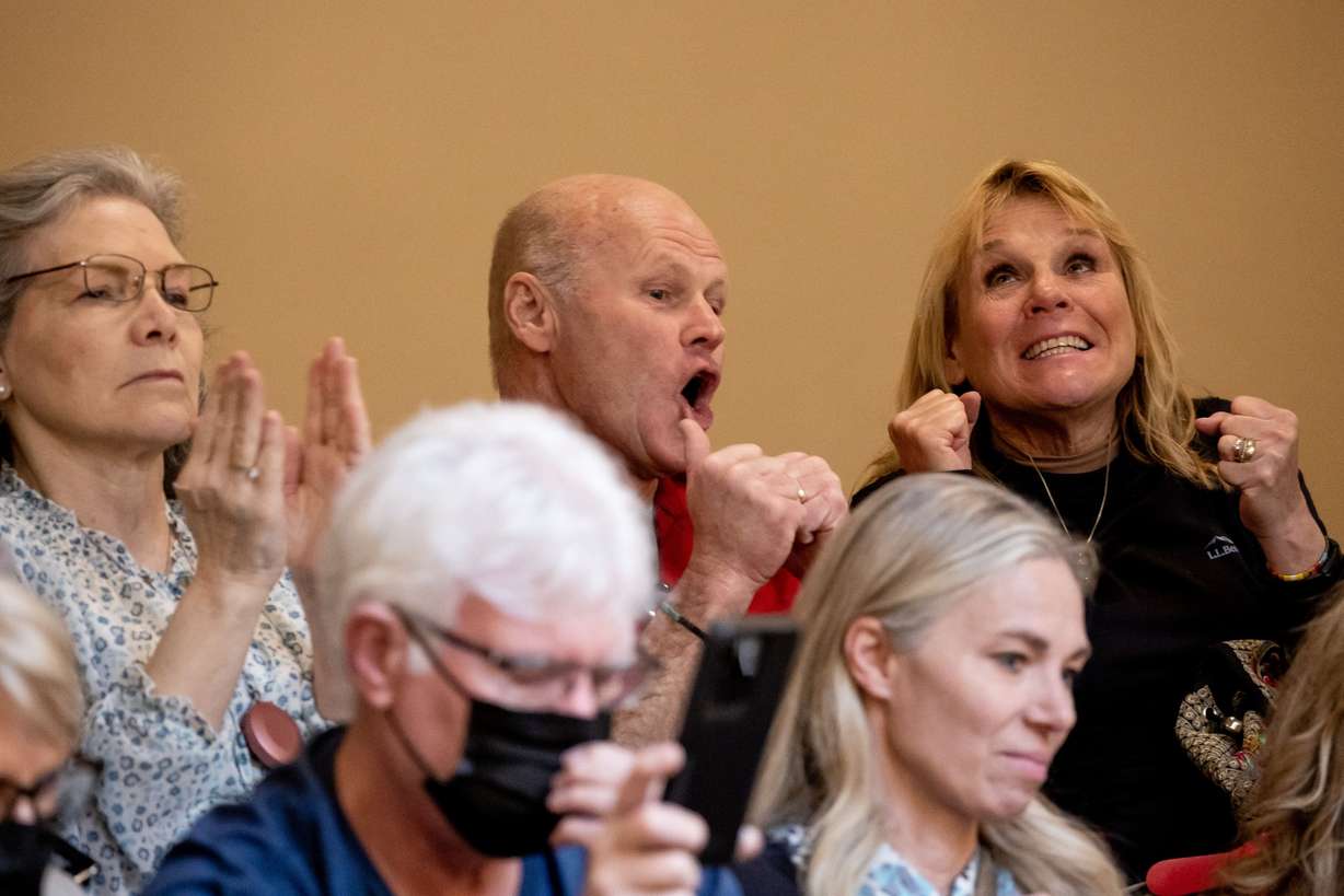 People in the Senate gallery celebrate after the Legislature successfully overrode the veto of HB11 at the Capitol in Salt Lake City on March 25. The bill bans transgender girls from participating in female school sports.