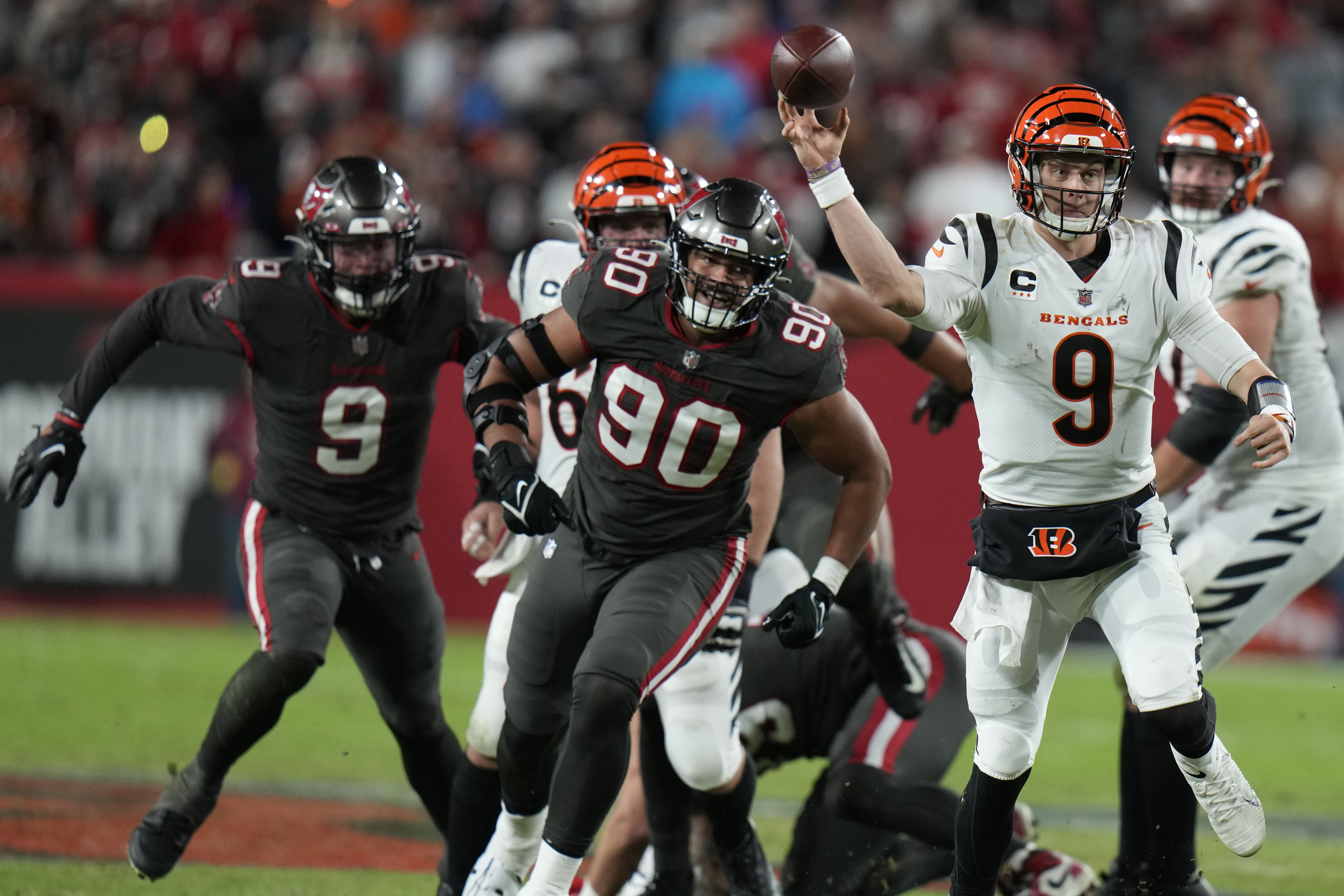 Cincinnati Bengals quarterback Joe Burrow (9) throws a pass against the Tampa Bay Buccaneers during the second half of an NFL football game, Sunday, Dec. 18, 2022, in Tampa, Fla. 