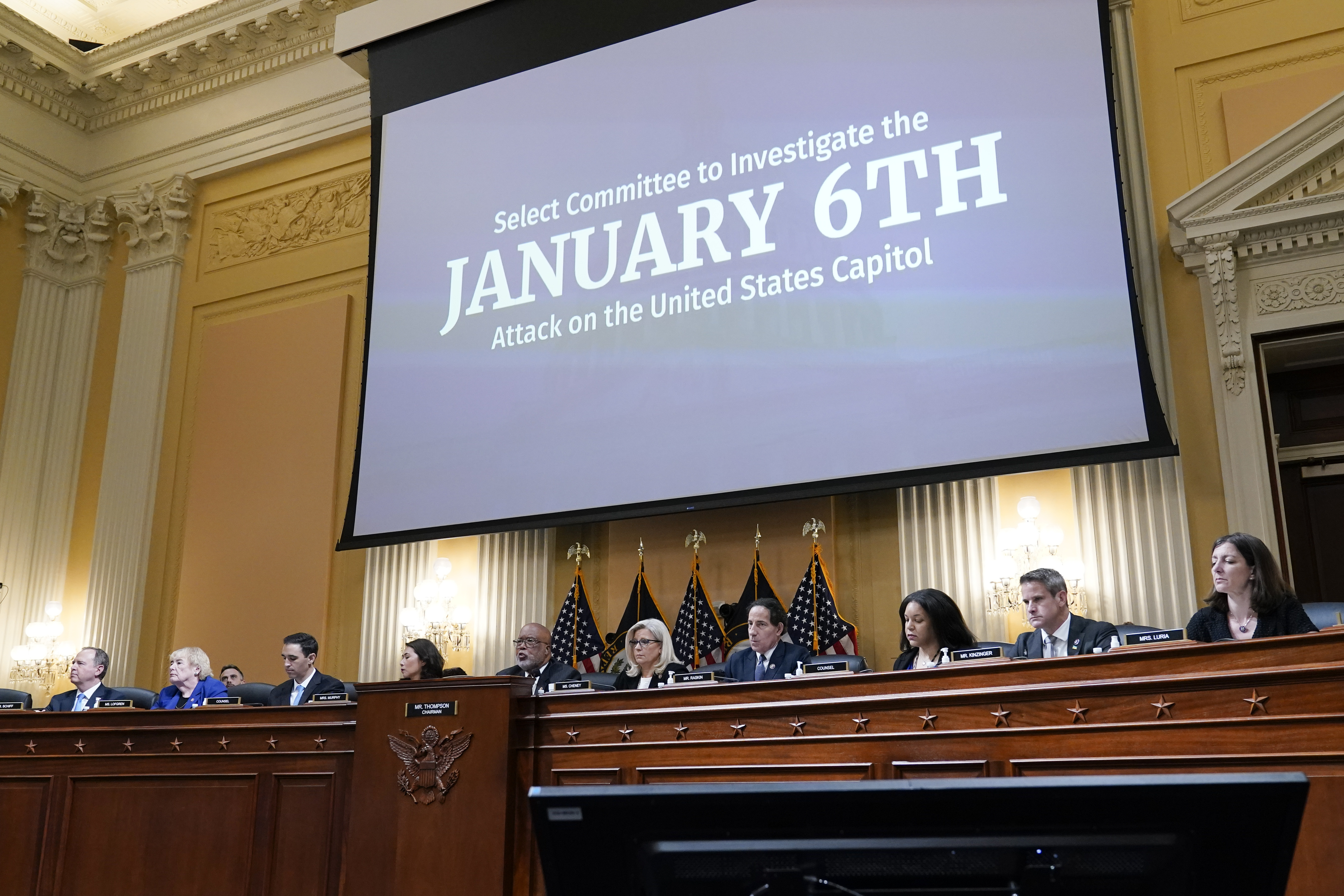 Members of a House select committee investigating the Jan. 6 attack on the U.S. Capitol holds a hearing at the Capitol in Washington, on July 12. The House Jan. 6 committee is recommending criminal charges against Trump and associates who helped him launch a multifaceted pressure campaign to try to overturn his 2020 election loss.