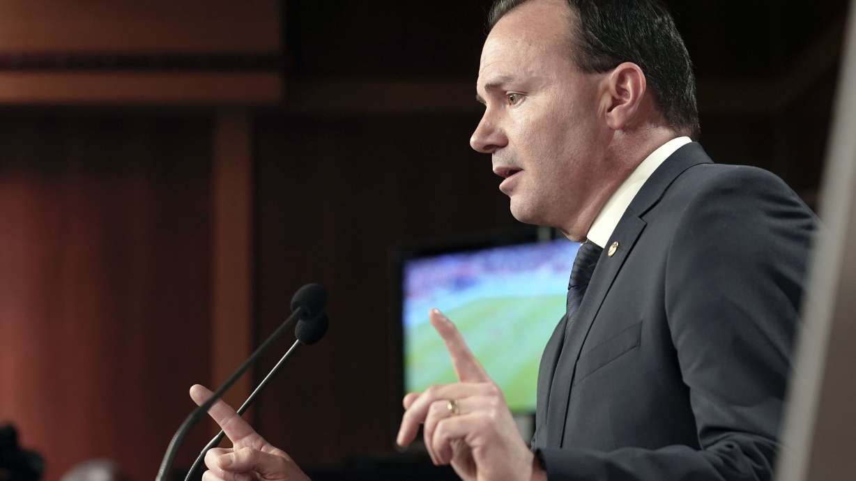 Sen. Mike Lee, R-Utah, speaks during a news conference on spending, Wednesday, on Capitol Hill in Washington. Lee criticized Defense Secretary Lloyd Austin for cutting off the pay of Navy Lt. Ridge Alkonis while he serves a three-year prison sentence in Japan.