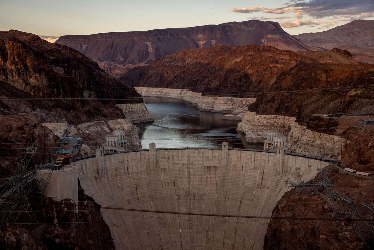 Hoover Dam holds back the waters of Lake Mead near Boulder City, Nev. on Oct. 9. The white rock along the shores of the reservoir is the so-called “bathtub ring” that shows how far water has declined from its historical high point.