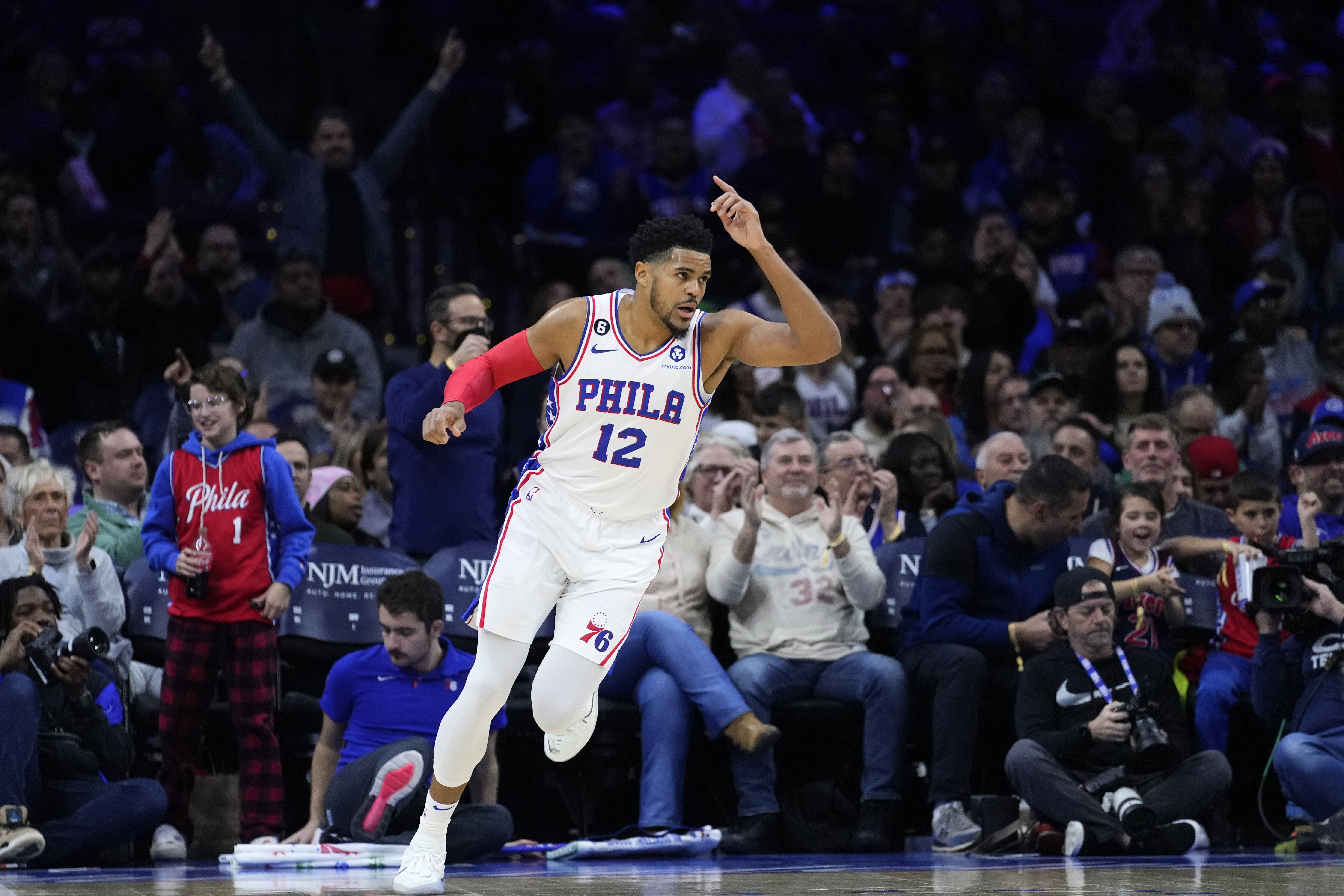 Philadelphia 76ers' Tobias Harris reacts after a basket during the first half of an NBA basketball game against the Toronto Raptors, Monday, Dec. 19, 2022, in Philadelphia. 