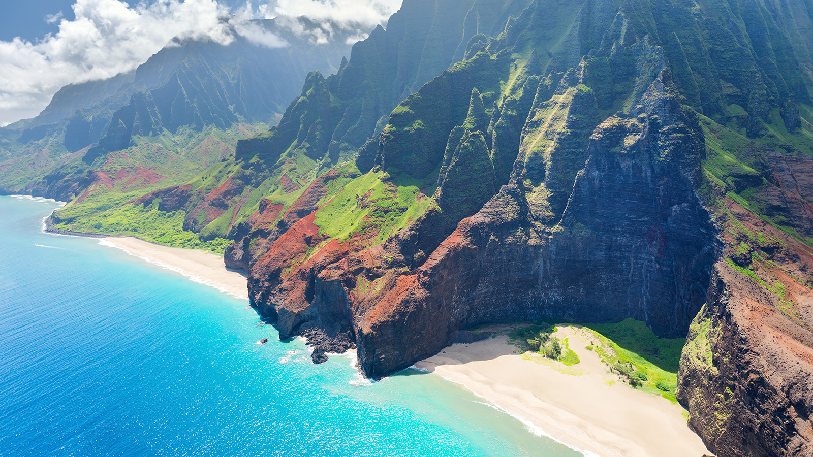 The view on Na Pali Coast on Kauai island on Hawaii on a sunny day.