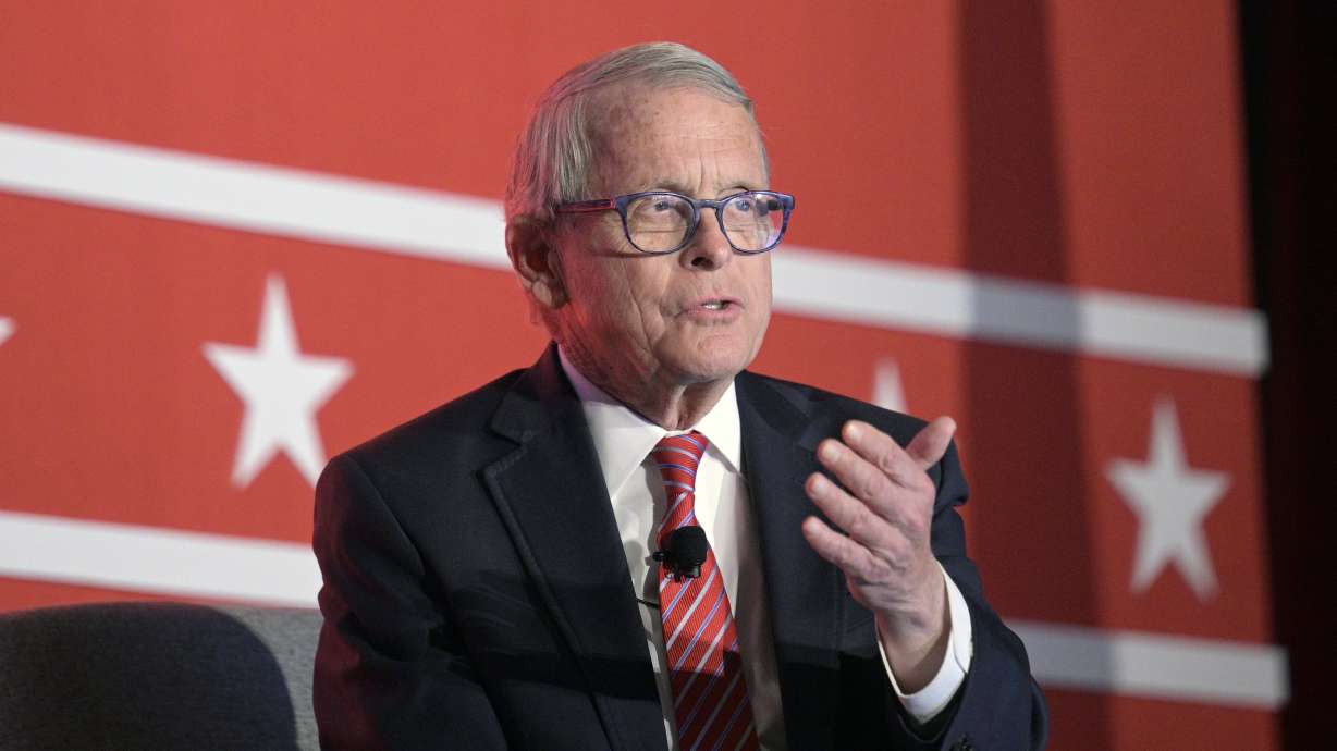 FILE - Ohio Gov. Mike DeWine answers a question while taking part in a panel discussion during a Republican Governors Association conference, Nov. 16, 2022, in Orlando, Fla. An Associated Press review finds that gambling interests positioning for lucrative business in Ohio's developing betting landscape gave nearly $1 million to a nonprofit that helped DeWine get reelected.