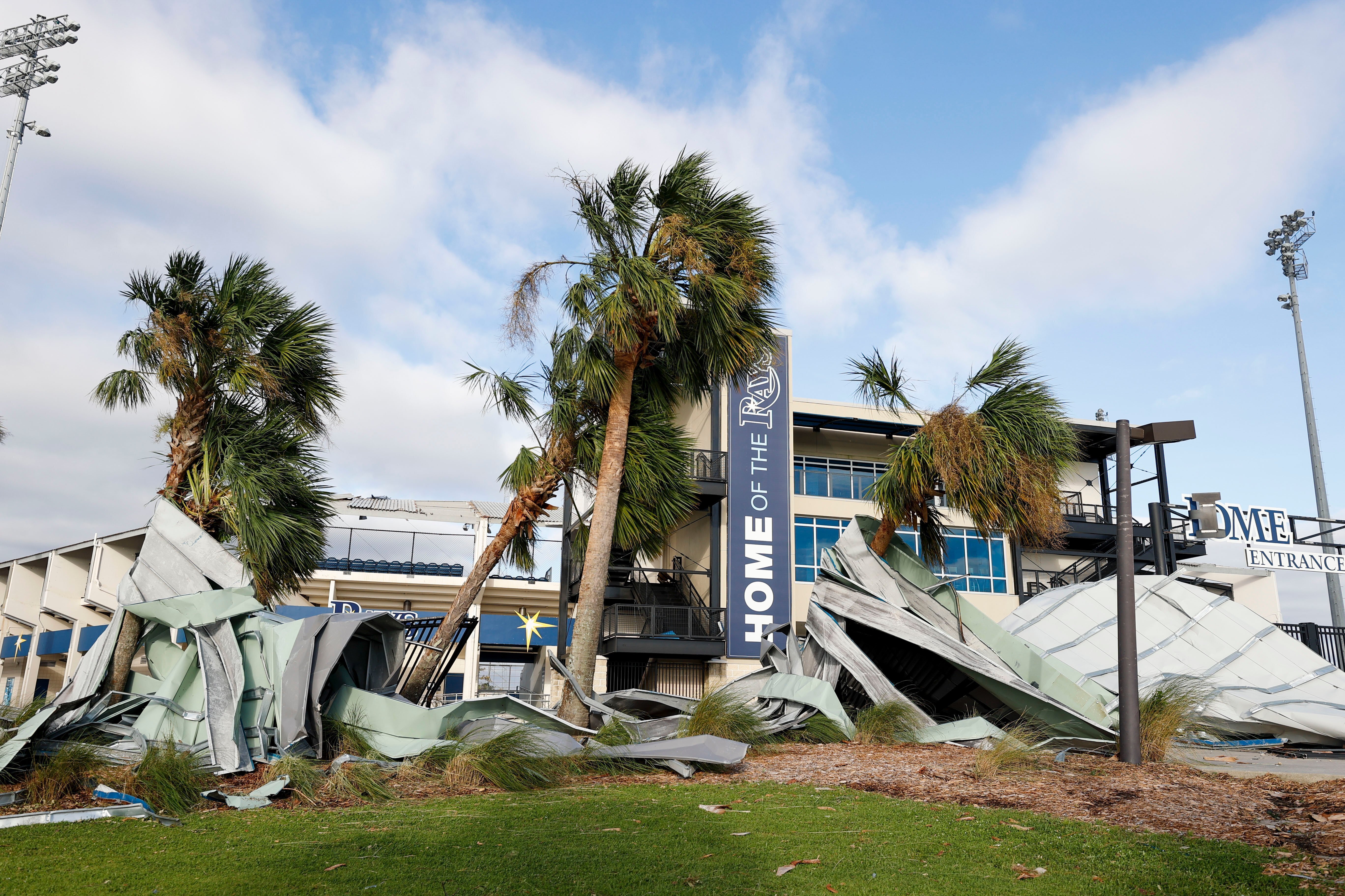 FILE - Damage caused by Hurricane Ian seen outside Charlotte Sports Park located on the grounds of the Tampa Bay Rays Spring Training baseball complex, Thursday, Sept. 29, 2022 in Port Charlotte. The Tampa Bay Rays will split their spring training between the ESPN Wide World of Sports Complex in Lake Buena Vista and Tropicana Field because of their own facility on Florida's Gulf Coast was damaged by Hurricane Ian, the team said Tuesday, Dec. 20, 2022.