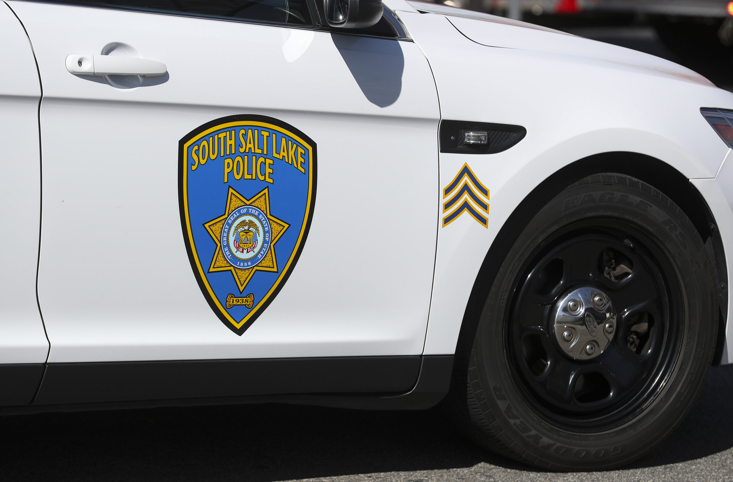 A man is facing criminal charges after police say he threatened a South Salt Lake school that was upholding a protective order against him.